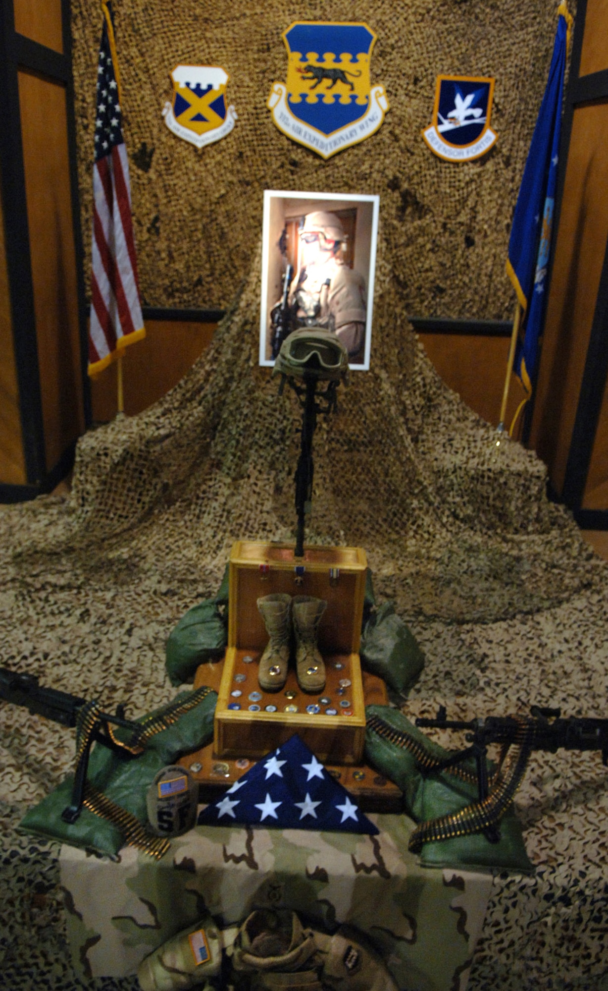 The display at Staff Sgt. John T. Self's memorial contained many personal items and mementos left by fellow Airmen and those who knew him well as a gesture of lasting respect May 18 at Balad Air Base, Iraq. Sergeant Self died during combat operations May 14 in the Baghdad area. (U.S. Air Force photo/Tech. Sgt. Alan Port)