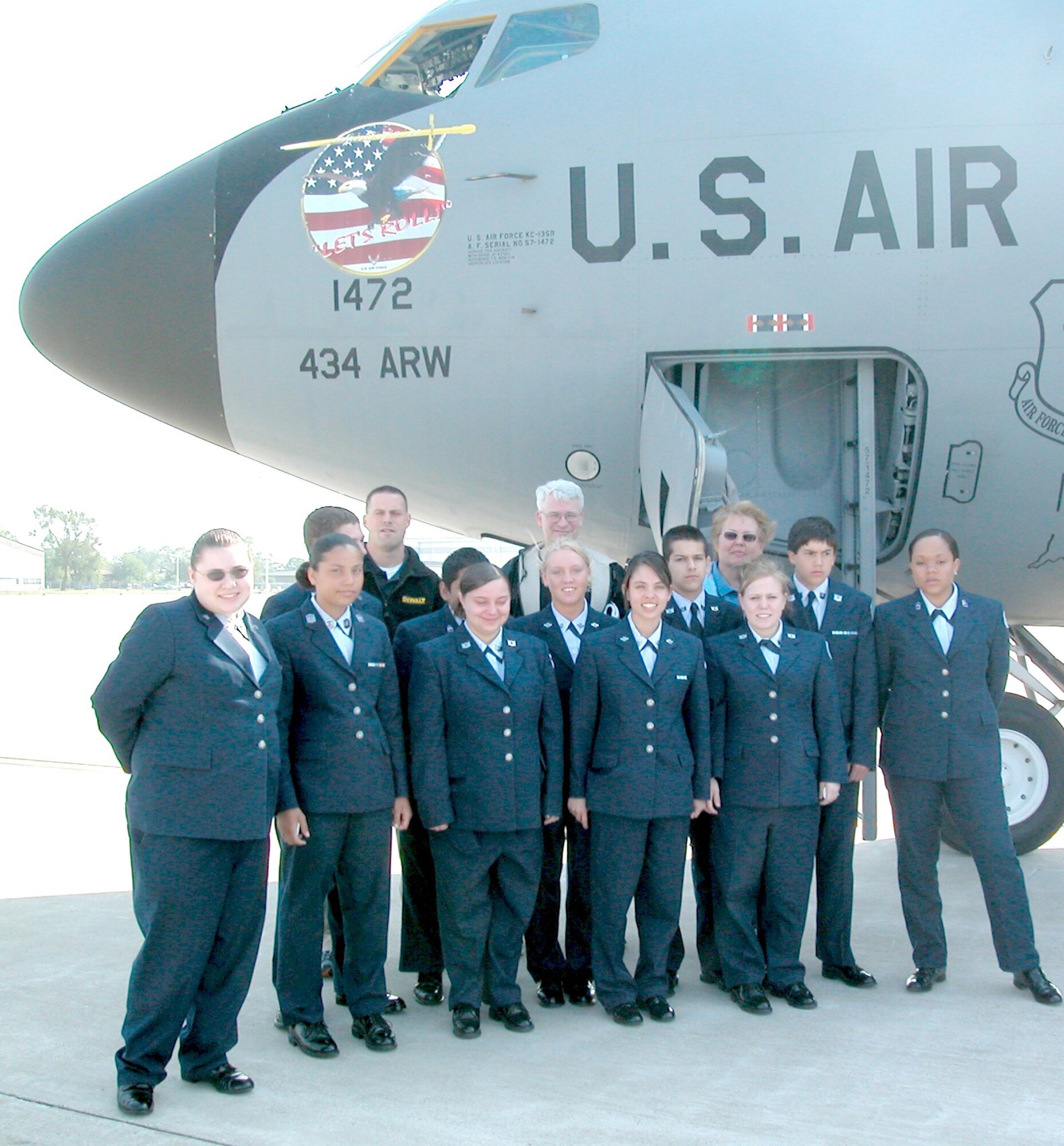 GRISSOM AIR RESERVE BASE, Ind., -- Air Force Junior ROTC cadets from Wayne High School in Fort Wayne, Ind., pose before climbing onto a KC-135R Stratotanker for an aerial refueling mission. The cadets got a first hand look at the 434th Air Refueling Wing's mission during their visit May 21. (U.S. Air Force Photo/Tech. Sgt. Doug Hays)