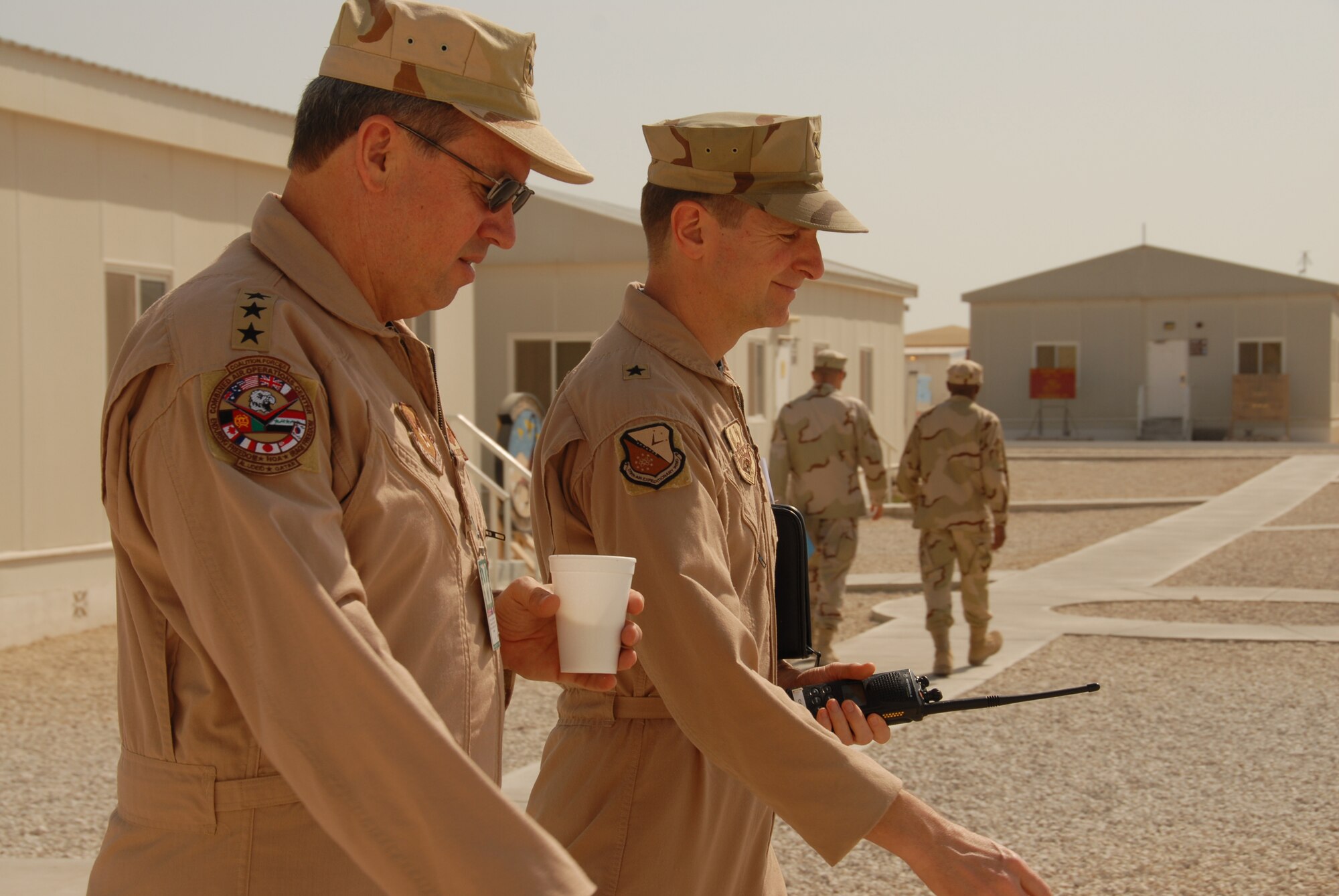 Lt. Gen. David Deptula (left), deputy chief of staff for intelligence, surveillance and reconnaissance, met with Brig. Gen. Charles Shugg (right), 379th Air Expeditionary Wing commander, during his visit here. The general discussed how a combined arms campaign with integrated airpower is the only way to build success in both theaters.