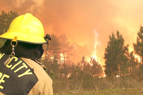 A firefighter from the Ray City Volunteer Fire Department prepares to fight a wildfire in Atkinson County, Ga. Moody firefighters have supported Ray City and other fire departments in past weeks. The fires have brought a considerable amount of smoke to the Valdosta area recently. (Photo courtesy of the Ray City Volunteer Fire Department)