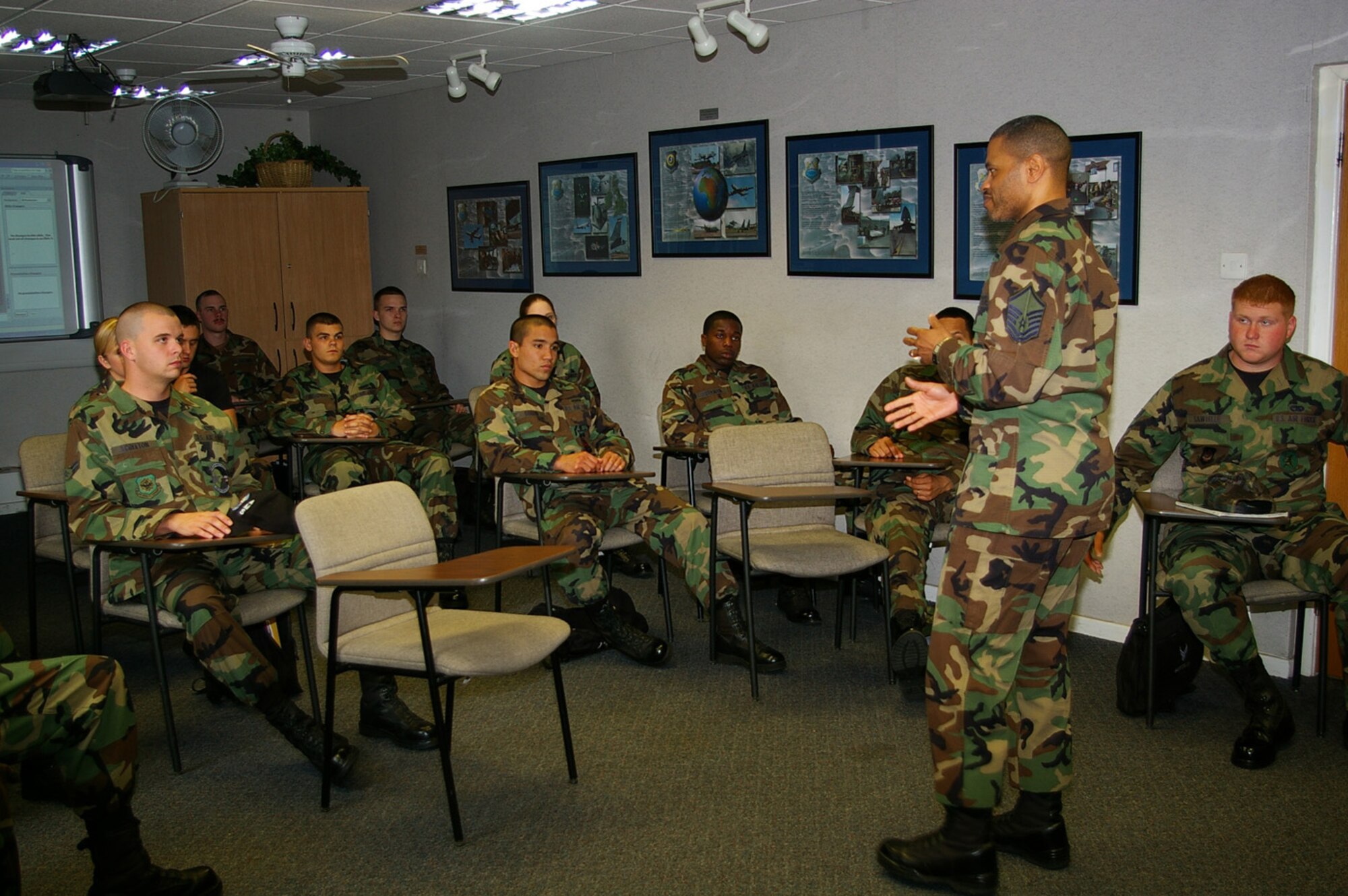 Master Sgt. Rodney Whitaker, standing, 100th Air Refueling Wing Ground Safety manager, talks to First Term Airmen's Center troops May 16 about his experience of being hit by a drunk driver. Sergeant Whitaker was speaking as part of the DUI panel, made up of 11 troops who have had a DUI affect their lives, whether they got a DUI, or were hit or injured by a drunk driver, or know someone who got a DUI. Those on the panel range from a senior master sergeant, who once had to identify the body of one of his troops who had been drink-driving, to Airmen who have received a DUI. Being on the panel is entirely voluntary, and gives those on it a chance to speak freely to new, young Airmen and share their stories. (U.S. Air Force photo by Karen Abeyasekere)