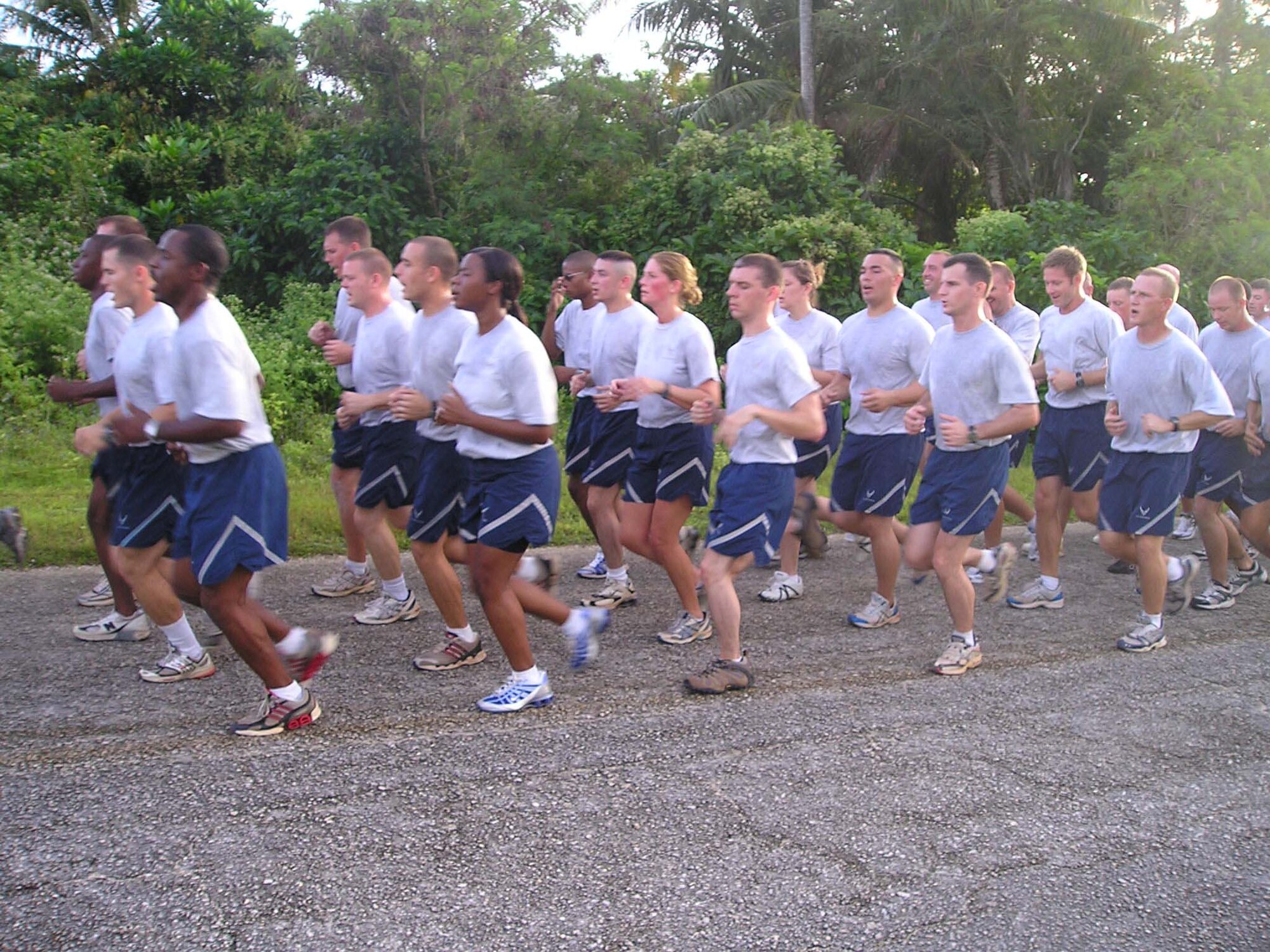Airmen from the 36th Contingency Response Group conduct a morning workout at Tarague Beach to stay “Fit to Fight.” The 36 CRG's physical training is structured to keep the Airmen from the group in top physical condition and ready to respond to any call short-notice deployment. The groups’ structured PT involves the entire squadron and works to bolster morale as well as to stay in shape.  (Courtesy Photo)