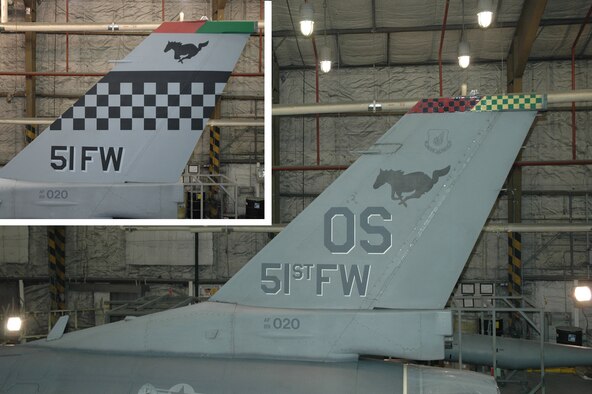 OSAN AIR BASE, Republic of Korea --  The old tailflash with the "OS" symbol, and (inset) the new heritage tailflash. (U.S. Air Force photo by Tech. Sgt. Michael O'Connor)