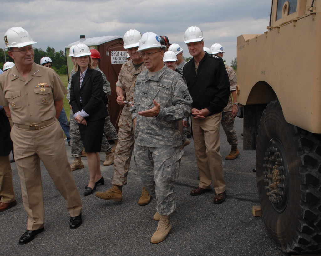 Army Col. John P. Rooney, commander of Aberdeen Test Center, gives a briefing on Mine Resistant Ambush Protected vehicles to Navy Adm. Edmund P. Giambastiani, vice chairman of the Joint Chiefs of Staff, and other members of the Joint Requirements Oversight Council at Aberdeen Proving Ground, Md., May 17, 2007. Photo by Tech. Sgt. Adam M. Stump, USAF