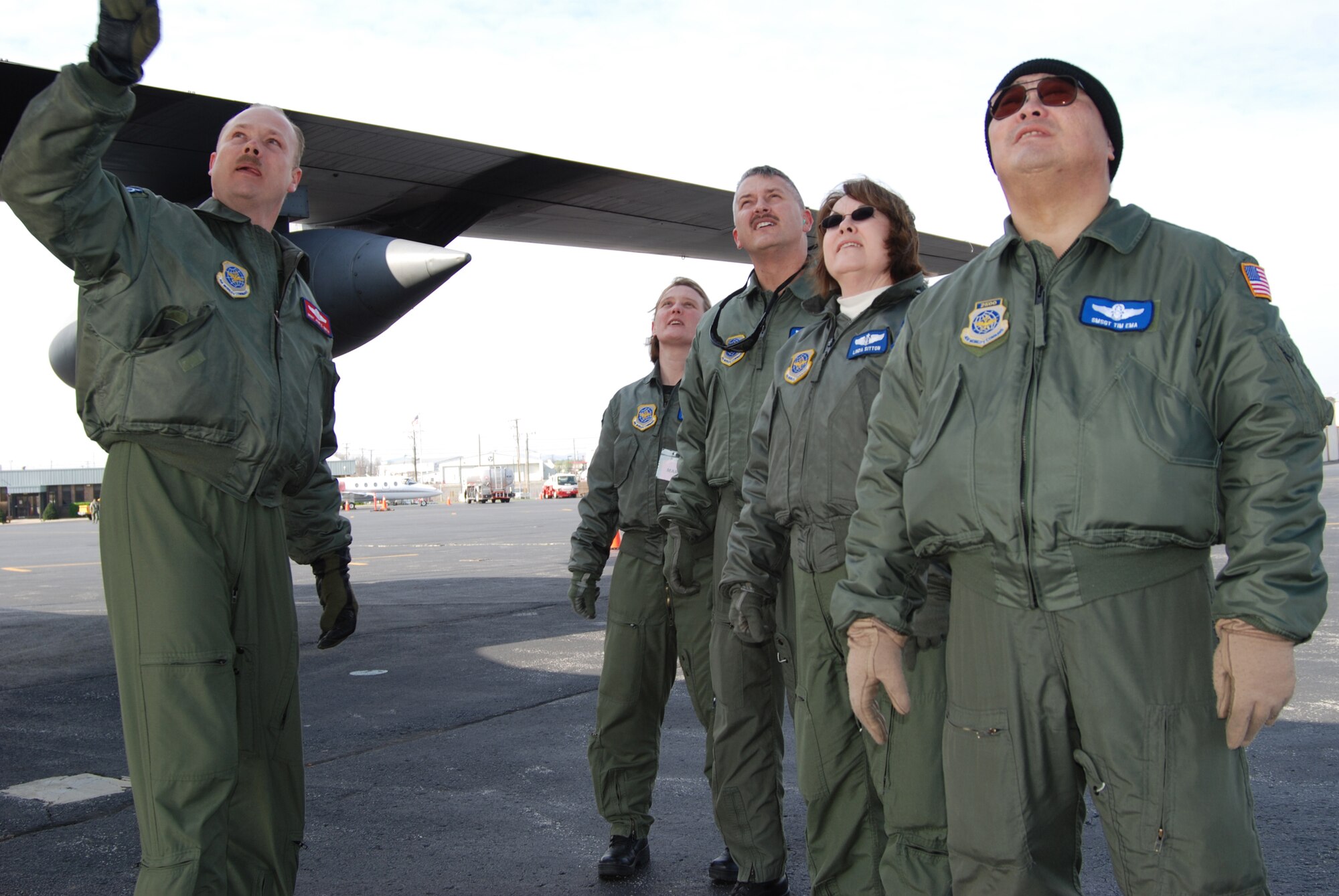 932nd Airlift Wing members check out a visiting C-130 during an Aeromedical Evacuation excercise.  Photo/Capt. Stan Paregien