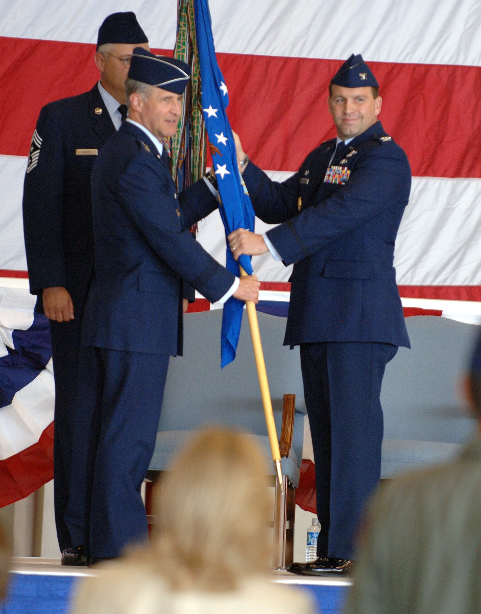 FAIRCHILD AIR FORCE BASE, Wash. – Col. Thomas Sharpy (right) assumes command of the 92nd Air Refueling Wing at a ceremony here May 22, with Maj. Gen. James Hawkins presiding. Colonel Sharpy was previously the 60th Air Mobility Wing vice commander at Travis Air Force Base, Calif. (U.S. Air Force photo/Senior Airman Chad Watkins)