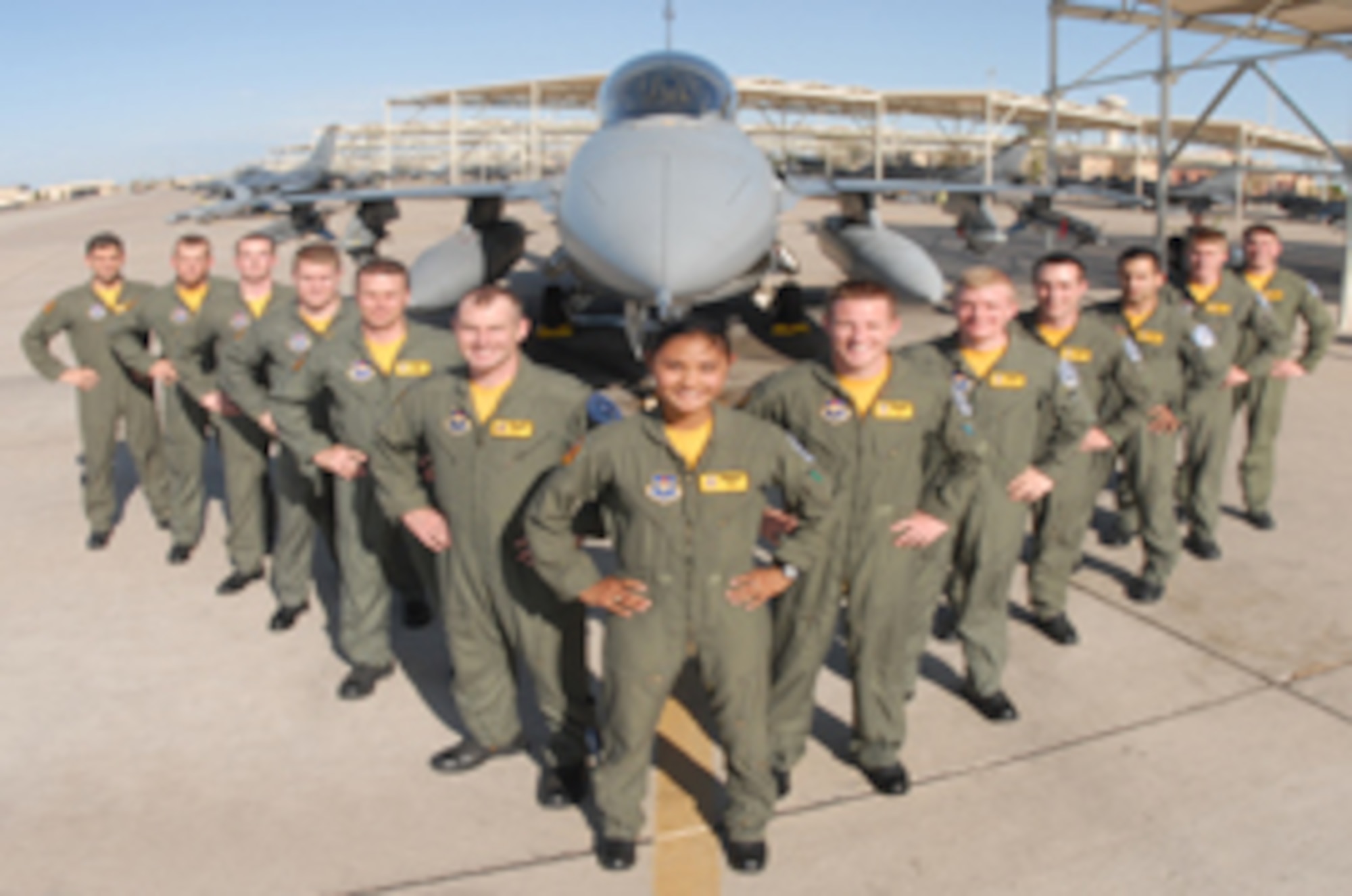 The 61st Fighter Squadron “Top Dogs” will graduate 13 students Saturday from class 07-ABC. They are from left: 1st Lts. Scott Butler, Chris Wells, Mark Hickie, Capt.
Mike Anderson, 1st Lts. Charlie Scharmann, Ben Walker, Monessa Catuncan, Ryan Thulin and Beau Provost, 2nd Lt. Jeremy Doohen, 1st Lts. Adam Hafez, Jason Wall and Dustin McCauley.