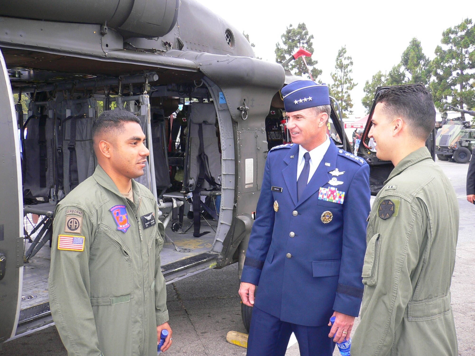 Gen. Kevin Chilton, Air Force Space Command commander, talks with soldiers at the Del Amo Mall. The mall was the site of numerous displays representing all Armed Forces as part of the 2007 Torrance Armed Forces Day celebration. The general served as the Grand Marshal for the parade. A Los Angeles AFB honor guard led the way as Los Angeles, Edwards, and Vandenberg Air Force Bases and March Air Reserve Base marched passed the crowds with a total of more than 300 airmen participating. 
