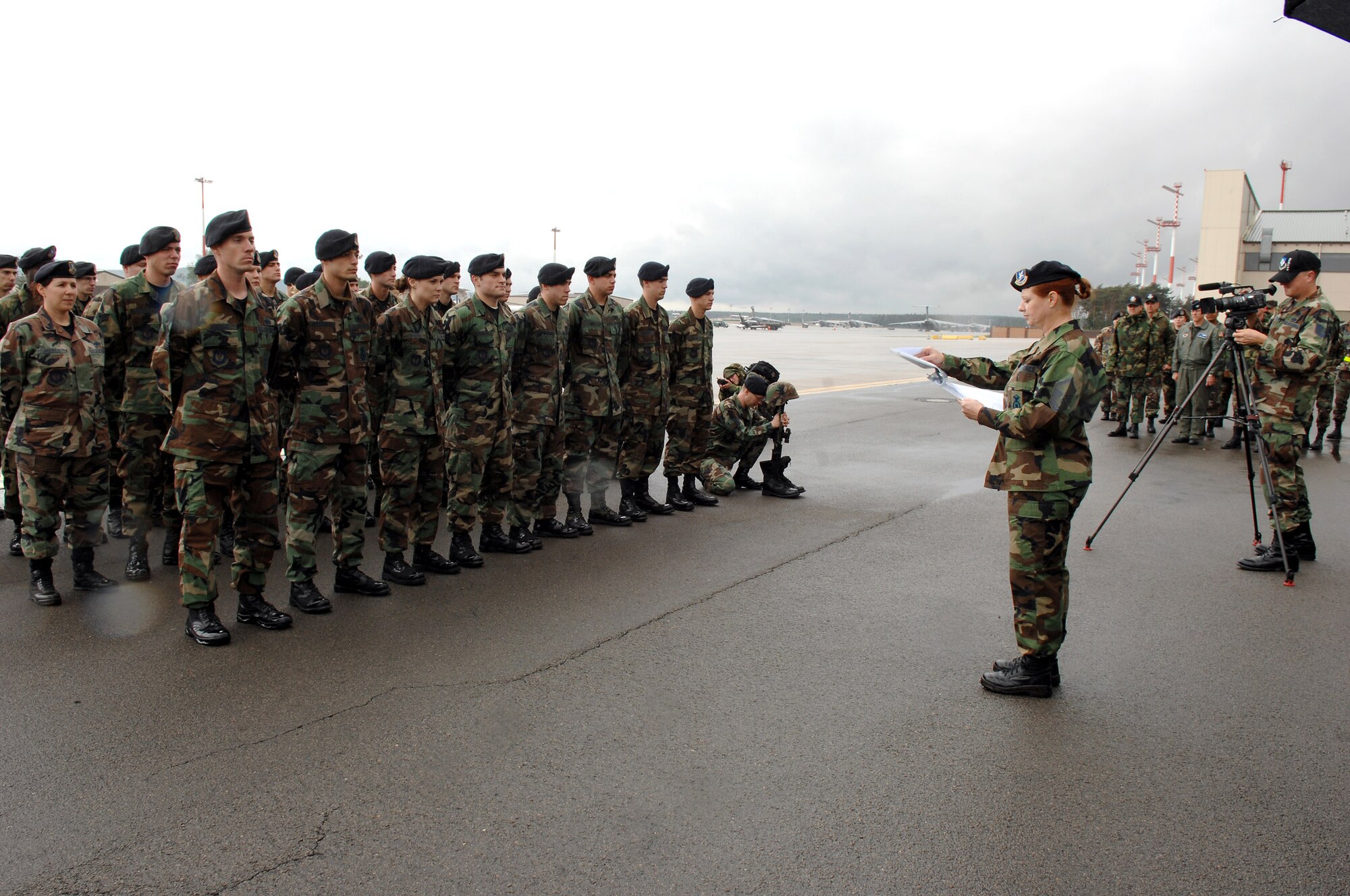 Master Sgt. Jenny Luttrell leads the Final Guard Mount Ceremony May 16 at Ramstein Air Base, Germany. The ceremony, which recognizes fallen security forces members, was held in conjunction with National Police Week. Sergeant Luttrell is a 435th Security Forces Squadron member.(U.S. Air Force photo/Senior Airman Levi Riendeau) 

