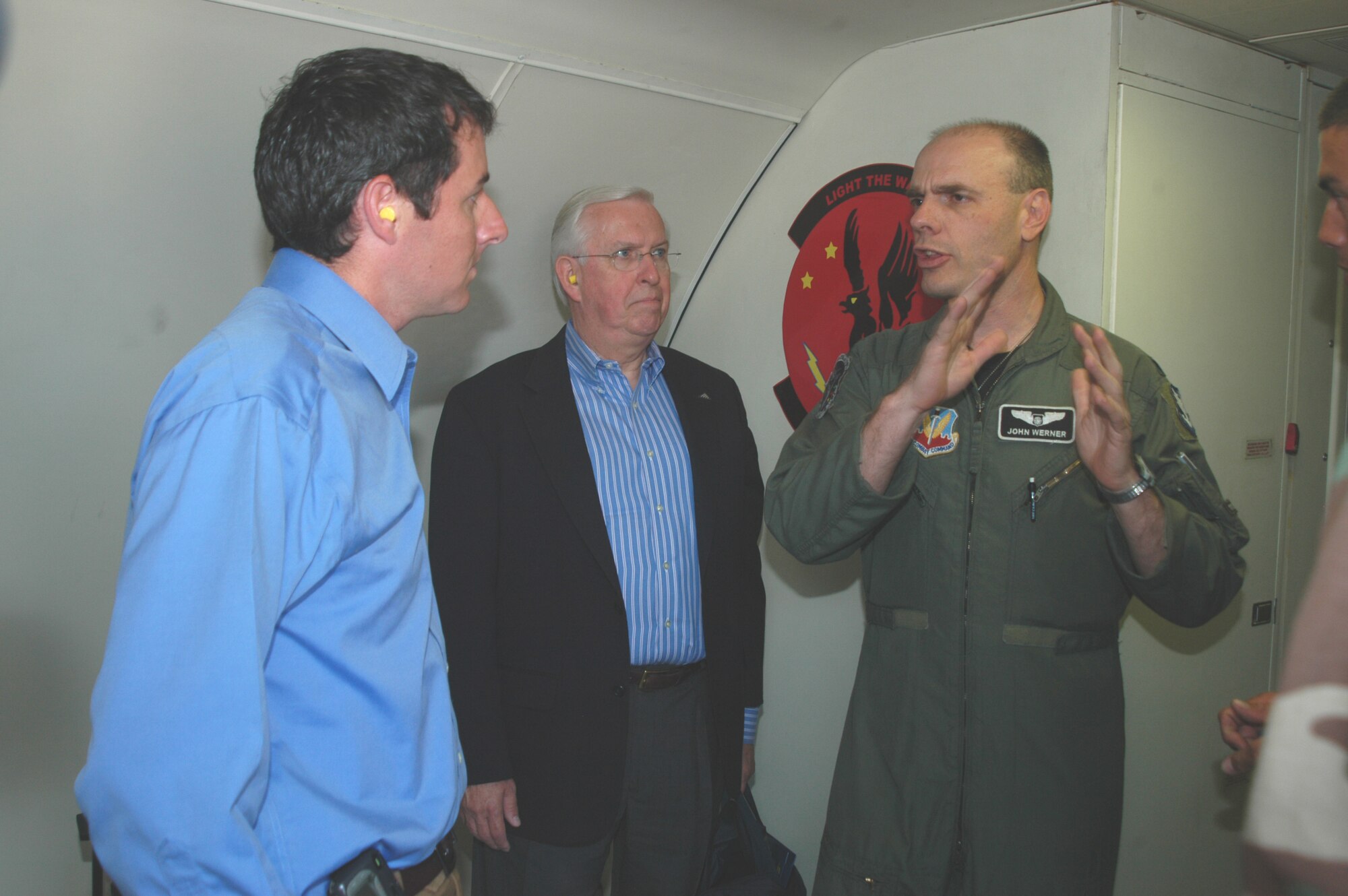 Lt. Col. John Werner, 116th Operations Group, explains to local media the Joint STARS mission while aboard the E-8C aircraft while deployed to Savannah, Ga. (Photo by Tech. Sgt. Tim Neville)