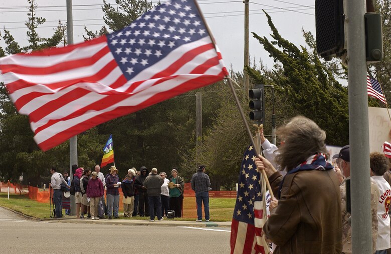 Residents of Lompoc, Calif., show support for Vandenberg Air Force Base personnel during a protest held on Armed Forces Day, May 19, at the Vandenberg main gate. This annual demonstration is scheduled by local citizens in protest against those across the street who oppose military and government actions and foreign policy. (U.S. Air Force Photo by Staff Sgt. Christina M. Rumsey)