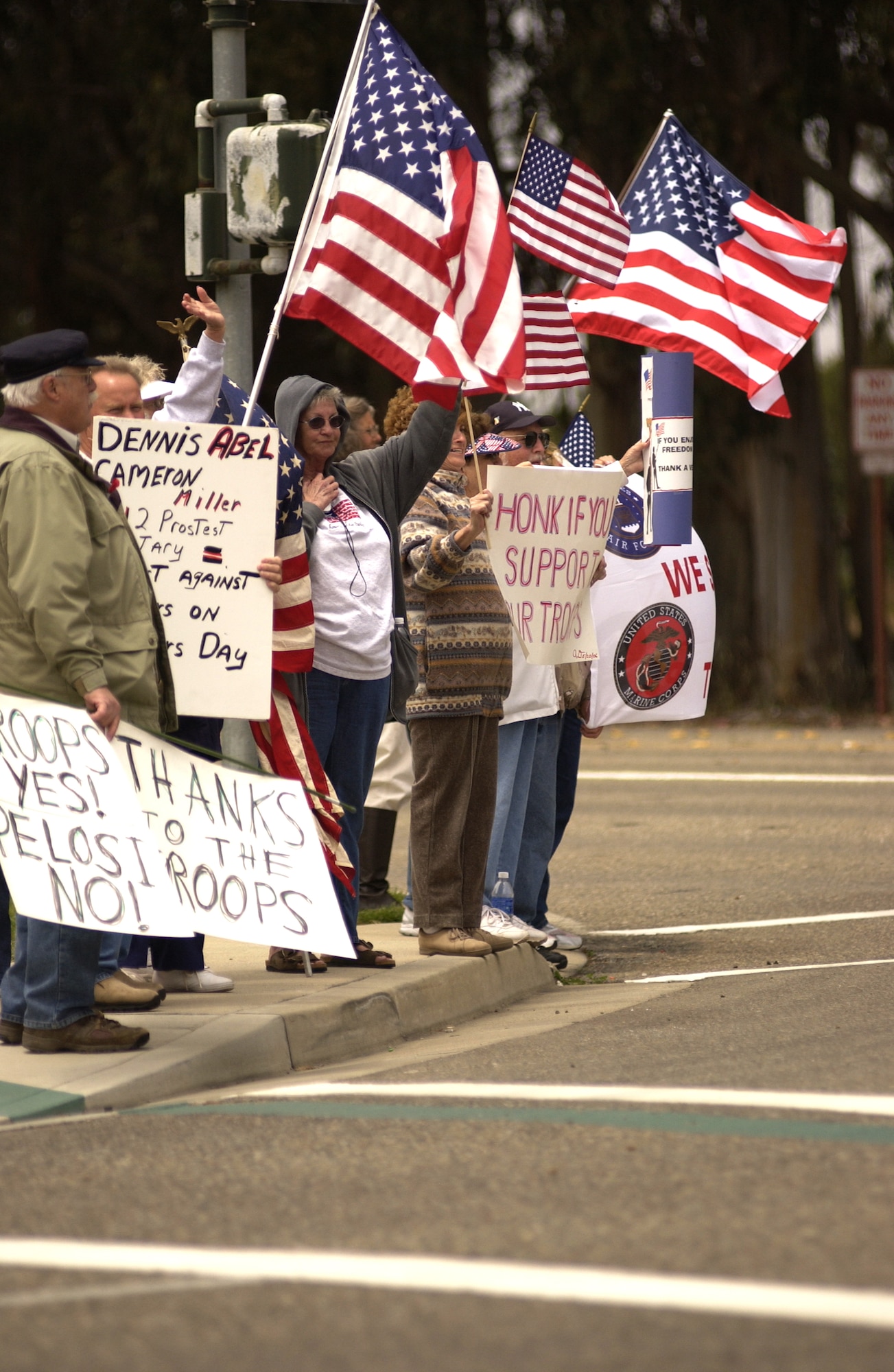 Residents of Lompoc, Calif., show support for Vandenberg Air Force Base personnel during a protest held on Armed Forces Day, May 19, at the Vandenberg main gate. This annual demonstration is scheduled by local citizens in protest against those across the street who oppose military and government actions and foreign policy. (U.S. Air Force Photo by Airman 1st Class Matthew Plew)