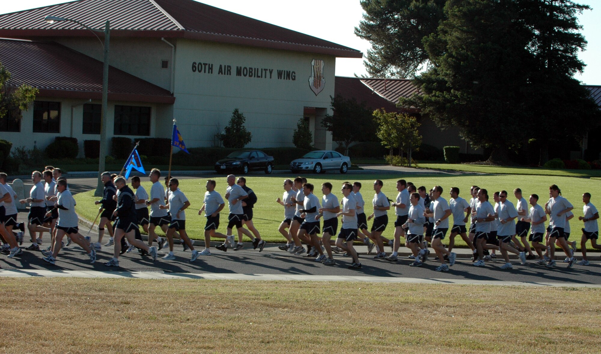 Team Travis members participate in the 60th Air Mobility Wing Fun run May 21. The event was part of Safety Focus Day which reminds Airmen members to keep safety at the forefront of all activities during the 101 Critical Days of Summer. (U.S. Air Force photo by Tech. Sgt. Donald Osborn)