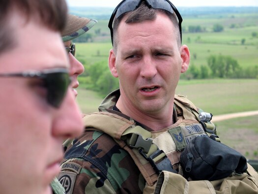 Tech. Sgt. John Strawn briefs fellow joint terminal attack controllers before the arrival of F-16 Fighting Falcons to the Smoky Hill Air National Guard Range, Kan. The JTACs stationed in Germany traveled to Kansas for training on the range. Sergeant Strawn is a JTAC from the 1st Air Support Operations Squadron. (U.S. Air Force photo/Staff Sgt. Leigh Bellinger) 