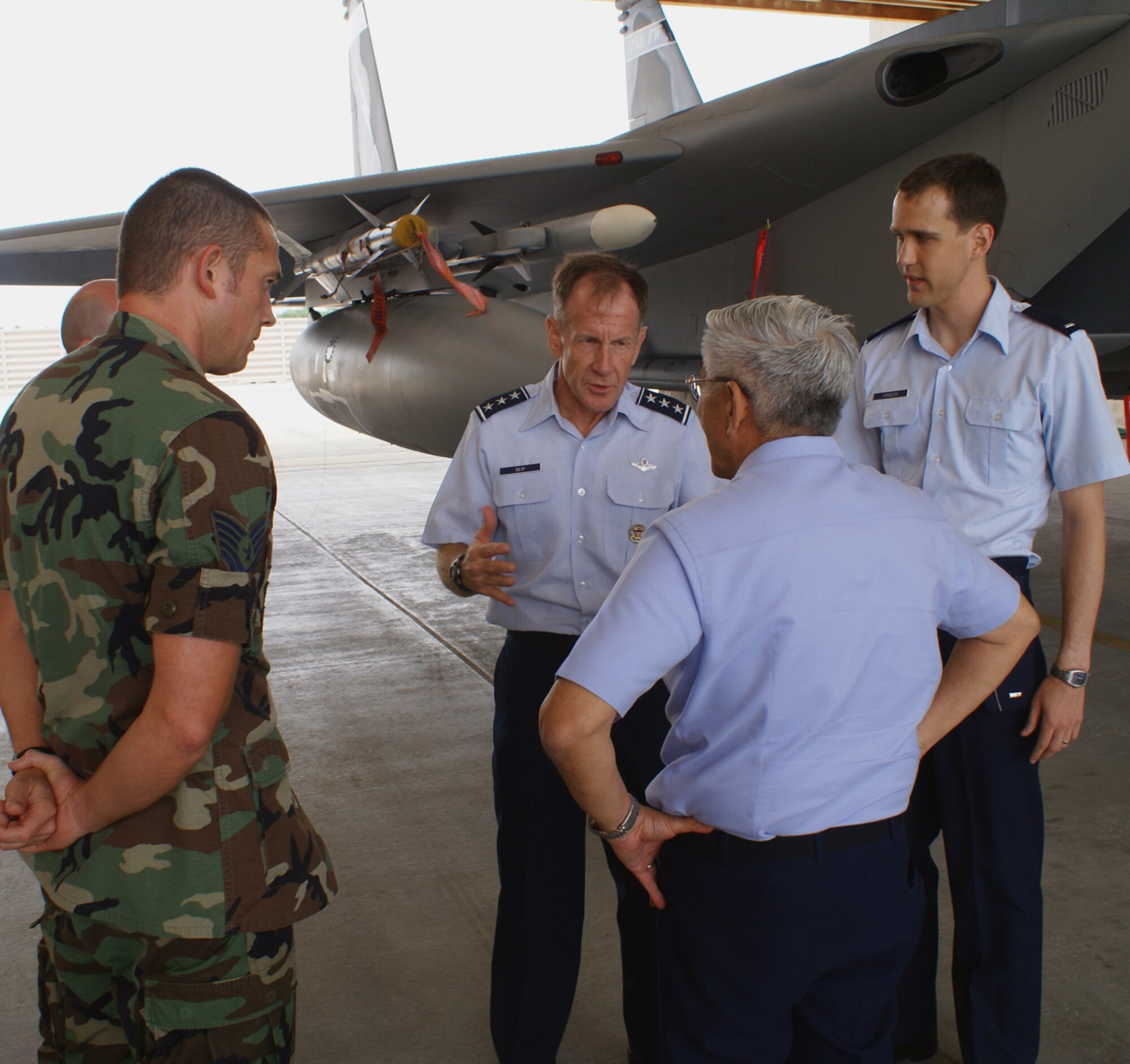 Lt. Gen. Norman R. Seip, 12th Air Force Commander, briefs Brazilian Air Force Commander Gen. Juniti Saito during a visit to Homestead Air Reserve Base, Fla., May 21.  Gen Saito visited Homestead as part of a five-day tour of Air Force bases in the United States.  During his short stop at Homestead the general received several briefings and toured the alert facility and saw F-15 fighter jets belonging to the Florida Air National Guard’s Detachment 1, 125th Fighter Wing.  The general is the Brazilian counterpart to Gen. T. Michael Moseley, Chief of Staff of the United States Air Force.  General Saito is scheduled to visit the Pentagon during his trip to meet with General Moseley.  The Brazilian Air Force inventory includes about 750 aircraft that are supported by more than 70,000 Airmen.  Also pictured is Tech. Sgt. Gary Holland, a tactical aircraft maintenance craftsman assigned to Detachment 1, 125th Fighter Wing, Florida Air National Guard. (U.S. Air Force photo/Jake Shaw)