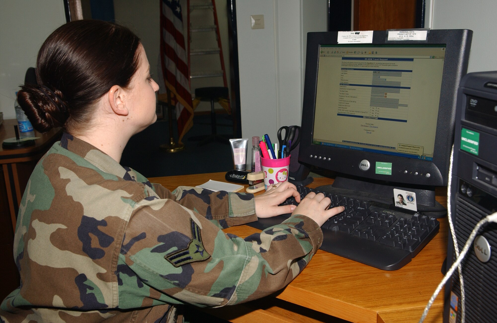 Airman 1st Class Kelly LeGuillon, 39th Air Base Wing Public Affairs, fills out a travel request form May 22.  Knowing where all Team Incirlik members are is critical to base force protection.  Submitting a travel request form may seem like a small detail, but could play a big role in keeping you safe. (U.S. Air Force photo by Airman 1st Class Tiffany Colburn)