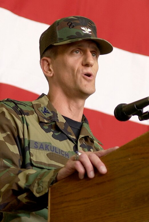 Colonel Timothy "Falcon" Sakulich, the new 8th Mission Support Group commander, speaks to his group and fellow Wolf Pack Airmen for the first time during his change of command ceremony here May 22. During his speech, he said "this MSG is known across the Air Force as the sought after crucible of experience that forges America?s best Airmen." He was last assigned as director, programs and resources, Headquarters U.S. Southern Command, Miami, Fla.  (U.S. Air Force photo/Staff Sgt. Darcy Ibidapo)
