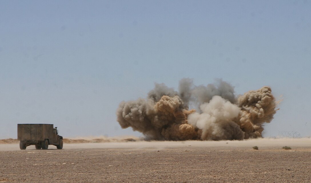 Demolition charges set by Marines from Combat Engineer Platoon, Battalion Landing Team 2/2, 26th Marine Expeditionary Unit, detonate at a training range in the Middle East, May 23, 2007.  The engineers were conducting live-fire demolition training alongside regional forces.  (Official USMC photo by Cpl. Jeremy Ross) (Released)