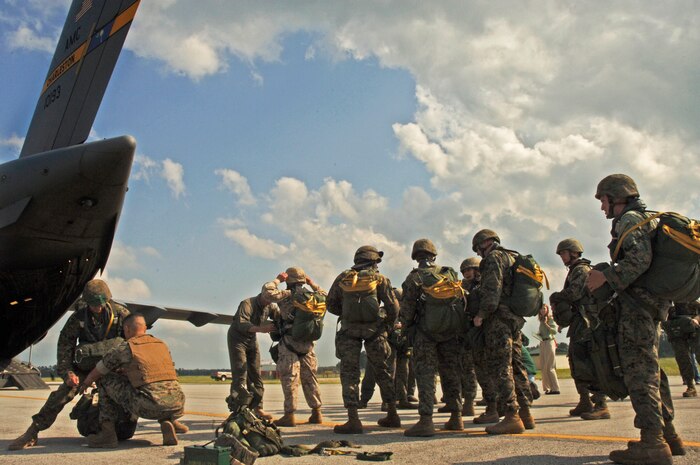 Marines get checked over one last time to ensure all their gear is properly secured before boarding the C-17 out of Charleston AFB for an exercie May 18.  (U.S. Air Force photo/Staff Sgt. April Quintanilla)