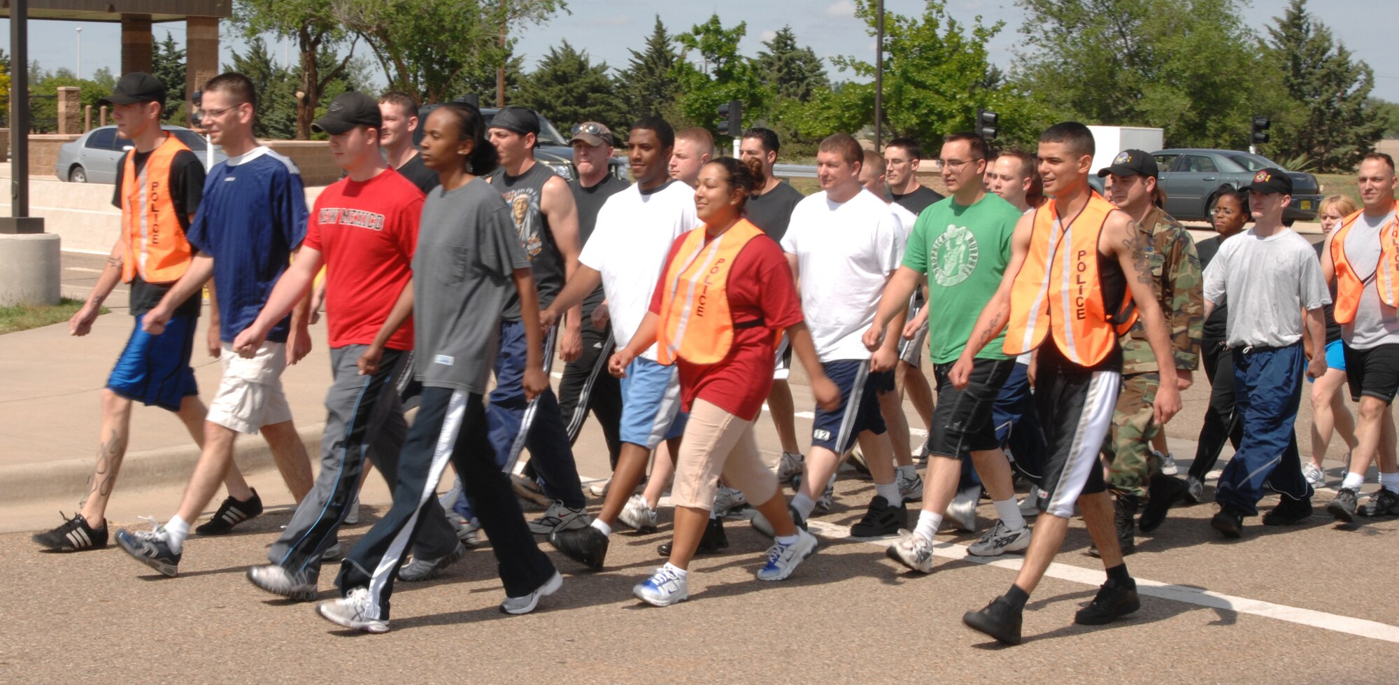 Airmen from the Airman Leadership School at Cannon Air Force Base, N.M. march to jail May 15 during the "jail and bail,"one of the events during National Police Week. May 13-19. (U.S. Air Force photo by Senior Airman Heather Redman)