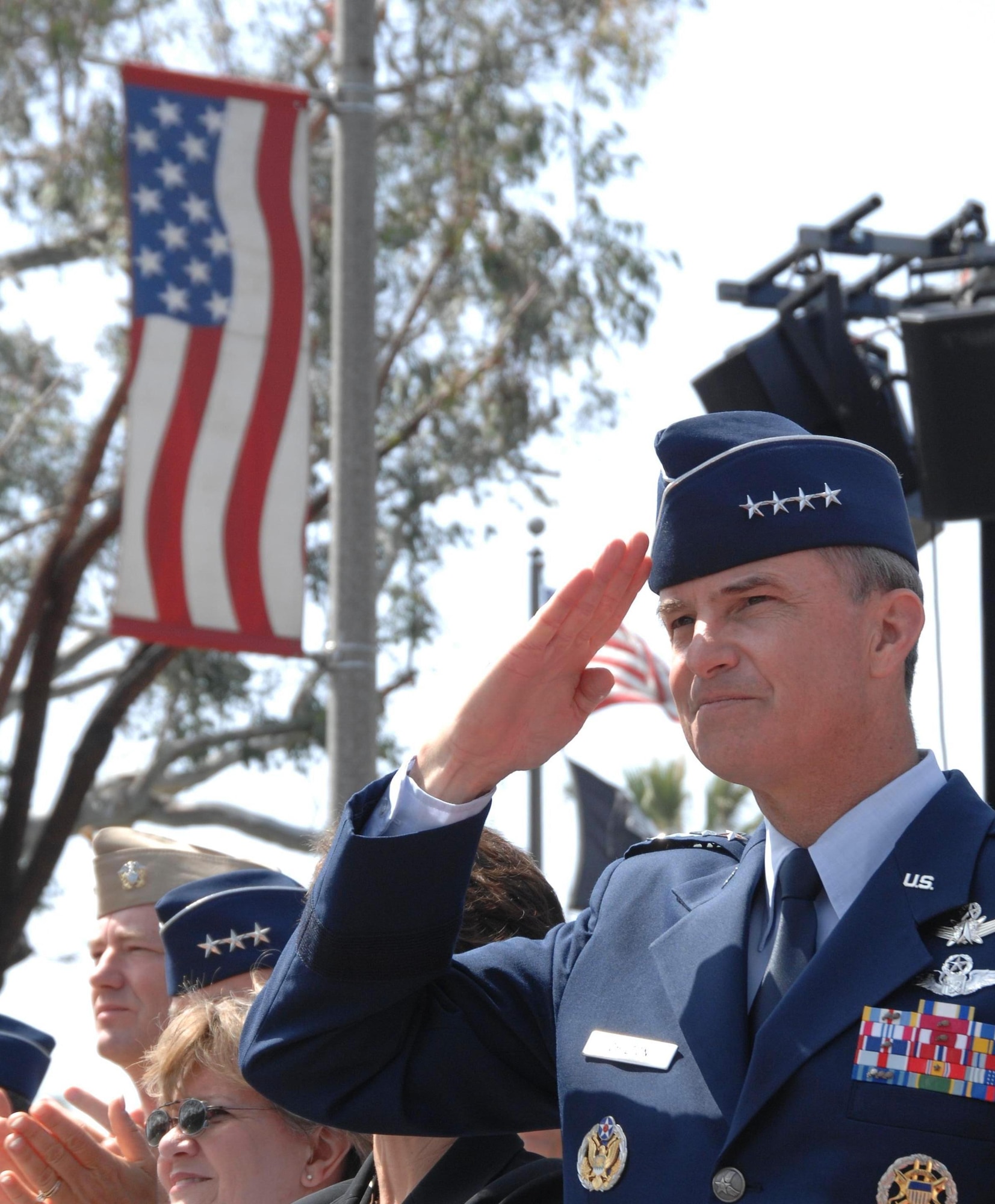 Gen. Kevin Chilton, Air Force Space Command commander, salutes a passing unit during the 2007 Torrance Armed Forces Day Parade. The general served as the parade's Grand Marshal. A Los Angeles AFB honor guard led the way as Los Angeles, Edwards, and Vandenberg Air Force Bases and March Air Reserve Base marched passed the crowds with a total of more than 300 airmen participating. 