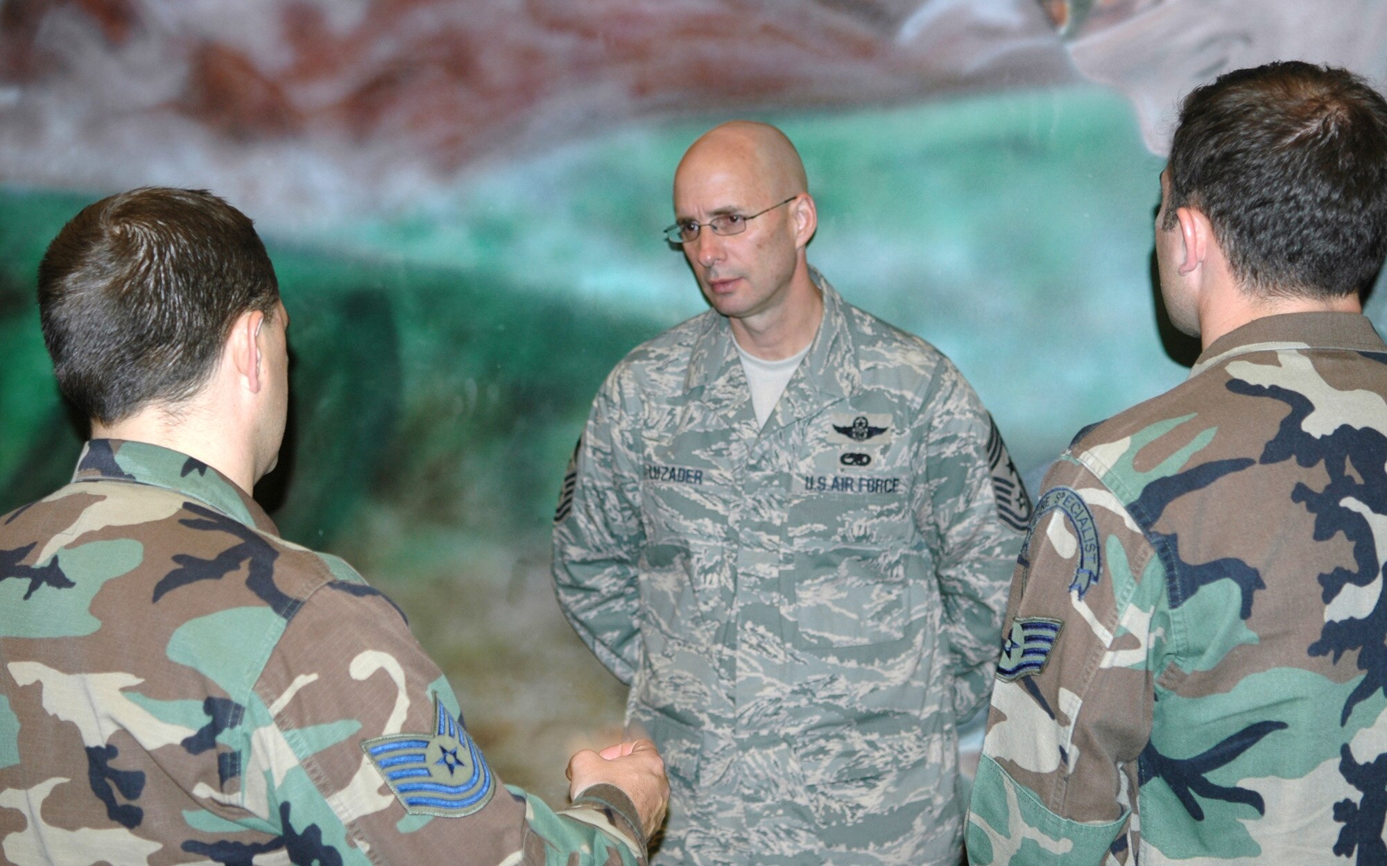FAIRCHILD AIR FORCE BASE, Wash. -- Chief Maser Sgt. Mark R. Luzader spends time answering Airmen’s questions at the Bud Day Building here May 9 after an enlisted call. The new Air Education and Training Command command chief was visiting the 336th Training Group to get a better understanding of its mission. (U.S. Air Force photo/Tech. Sgt. Larry Carpenter)