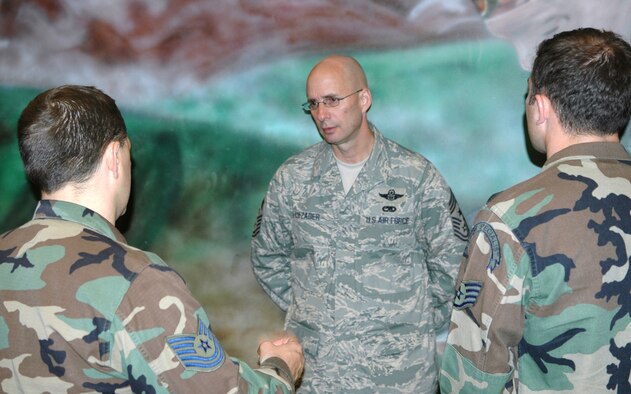 FAIRCHILD AIR FORCE BASE, Wash. -- Chief Maser Sgt. Mark R. Luzader spends time answering Airmen’s questions at the Bud Day Building here May 9 after an enlisted call. The new Air Education and Training Command command chief was visiting the 336th Training Group to get a better understanding of its mission. (U.S. Air Force photo/Tech. Sgt. Larry Carpenter)