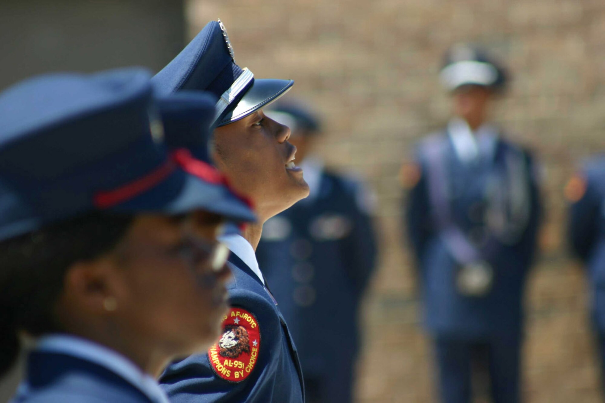 Cadet Antonio Thompson, from Prattville High School's Junior ROTC unit AL-951, calls cadence as his column of cadets march in a drill demonstration. Members of the Air Force Officer Accession and Training Schools staff participated in various activities earlier this month highlighting all echelons of the organization. (U.S. Air Force photo/Staff Sgt. Jason Lake) 