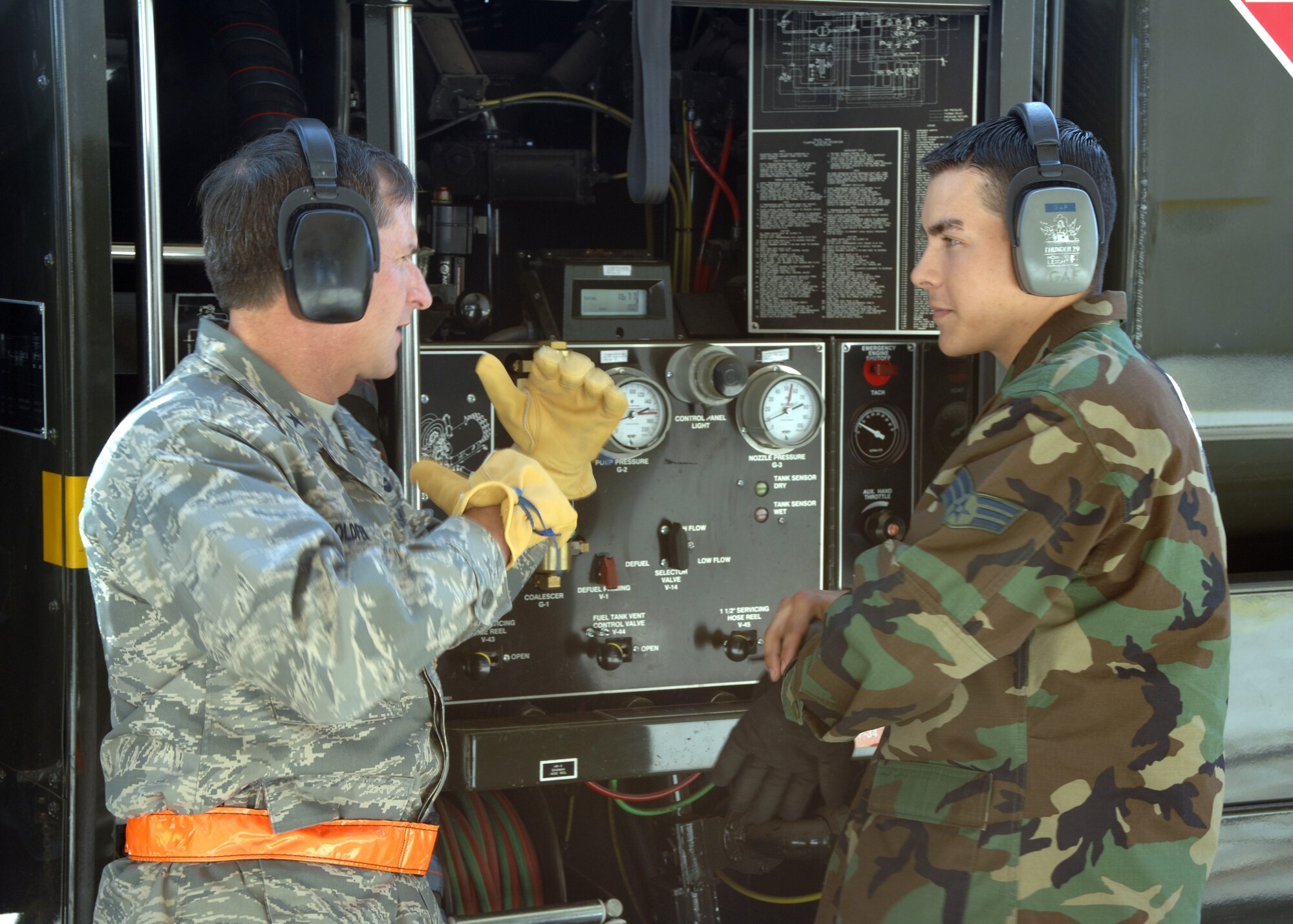 Senior Airman Jeffrey Messer, 49th Logistics Readiness Squadron, explains how to refuel a jet to Brig. Gen. David Goldfein, 49th Fighter Wing commnander. The general spent time with Airman Messer learning and performing his job as part of an initiative to learn more about what each unit on base does. (U.S. Air Force photo by Airman 1st Class Jamal Sutter)