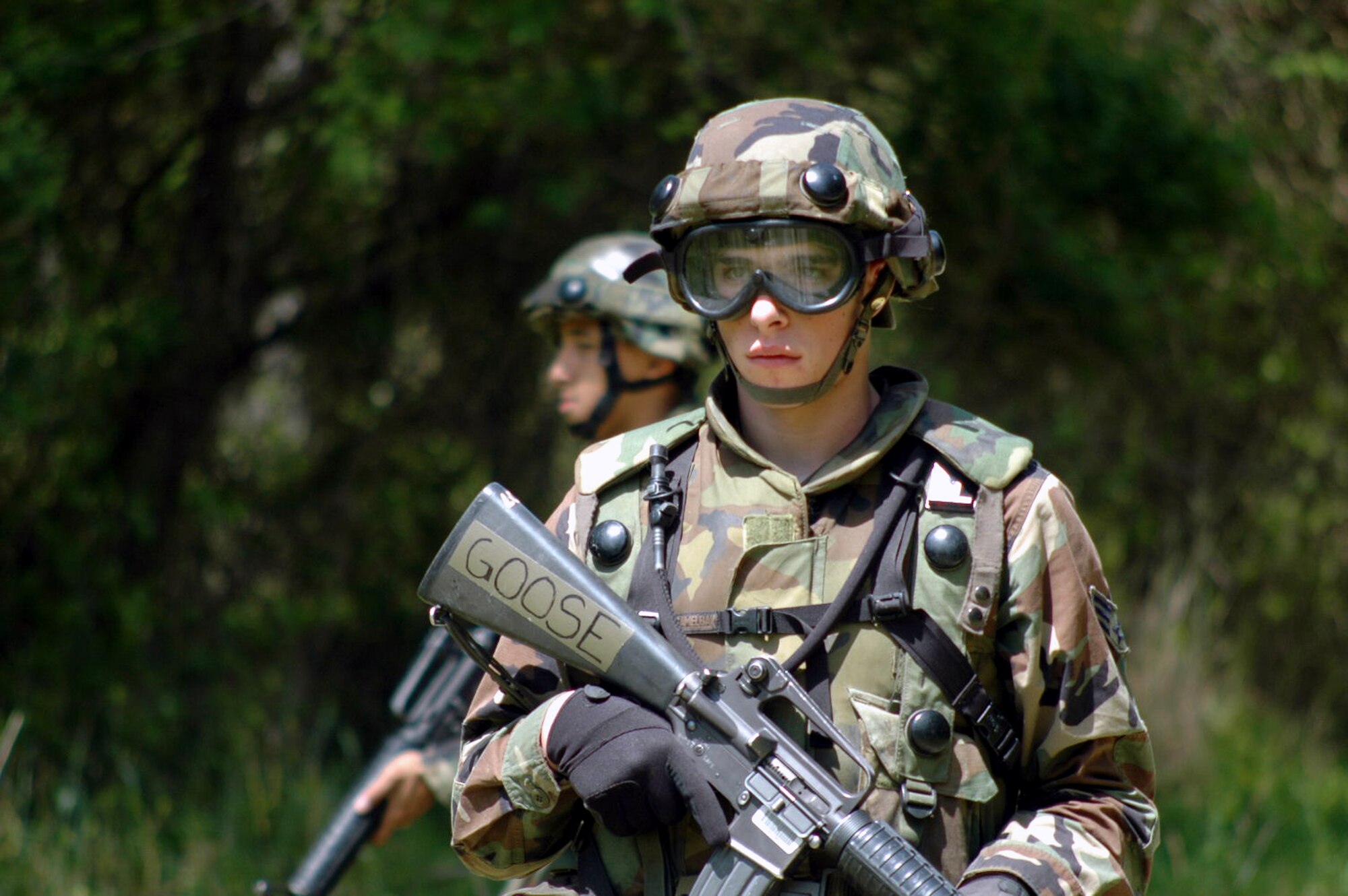 U.S. Air Force Senior Airman Jacob Finn, hydraulics technician from Little Rock Air Force Base, Ark., practices patrolling as a member of a squad during a patrolling and tactics class for the Air Force Advanced Contingency Skills Training Course 07-2C May 14, 2007, at Fort Dix, N.J.  The course, taught by the U.S. Air Force Expeditionary Center's 421st Combat Training Squadron, prepares Airmen for upcoming deployments in a variety of combat skills.  (U.S. Air Force Photo by Tech. Sgt. Scott T. Sturkol)