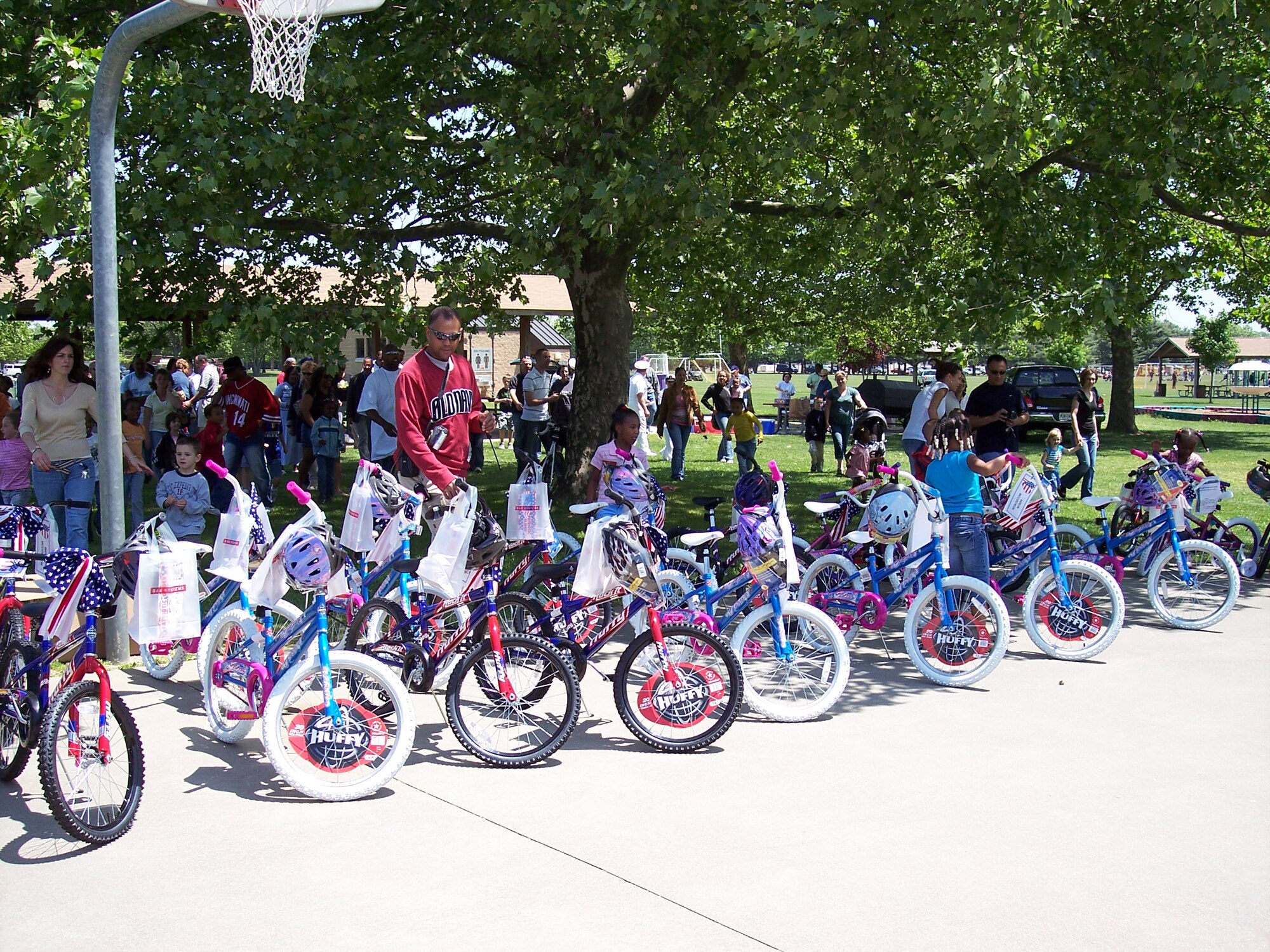 McGuire, Fort Dix and Naval Air Engineering Station Lakehurst families attend the bike give-a-way at John Mann Park at Fort Dix May 20. To help celebrate Month of the Military Family, BAE Systems donated brand-new bicycles to children from McGuire, Fort Dix and Lakehurst as a way of saying thank you for the sacrifices made by military families. 
