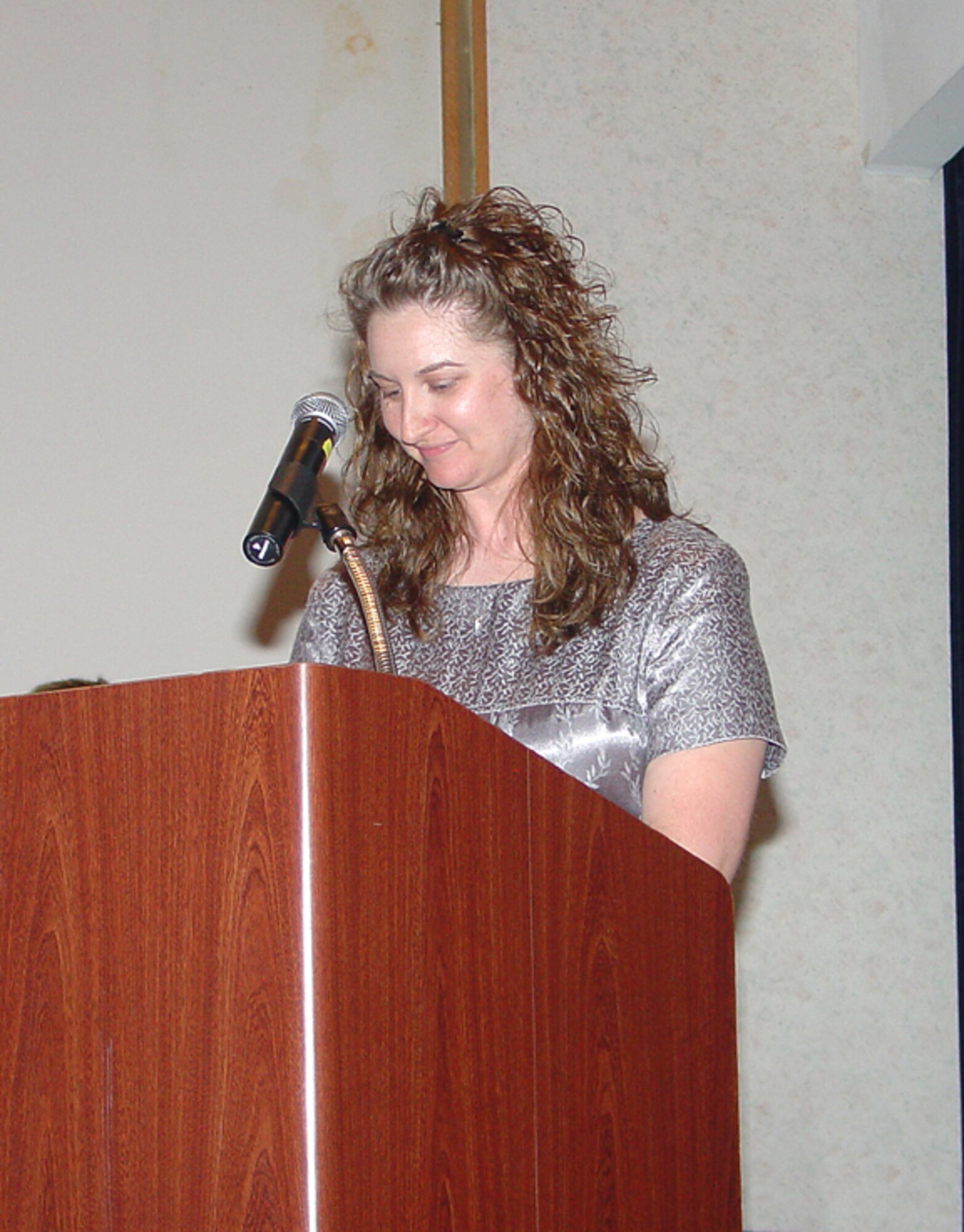 Betsy Conzo, Family Support Center, gives the opening remarks at the FSC Seventh Annual Volunteer Appreciation Luncheon here May 14. Volunteers were presented with certificates for assistance at the FSC, as well as with the Relocation Assistance, Heart Link, Hearts Apart, Airmen’s Attic and Phoenix Spouse programs. For more information or to become a volunteer, call the FSC at (609) 754-3154.