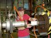 Machinist Larry Phipps at the Air Force’s Arnold Engineering Development Center loads a foam projectile into an 86-foot-long rectangular barrel used to conduct impact testing for the Space Shuttle Return to Flight program.
