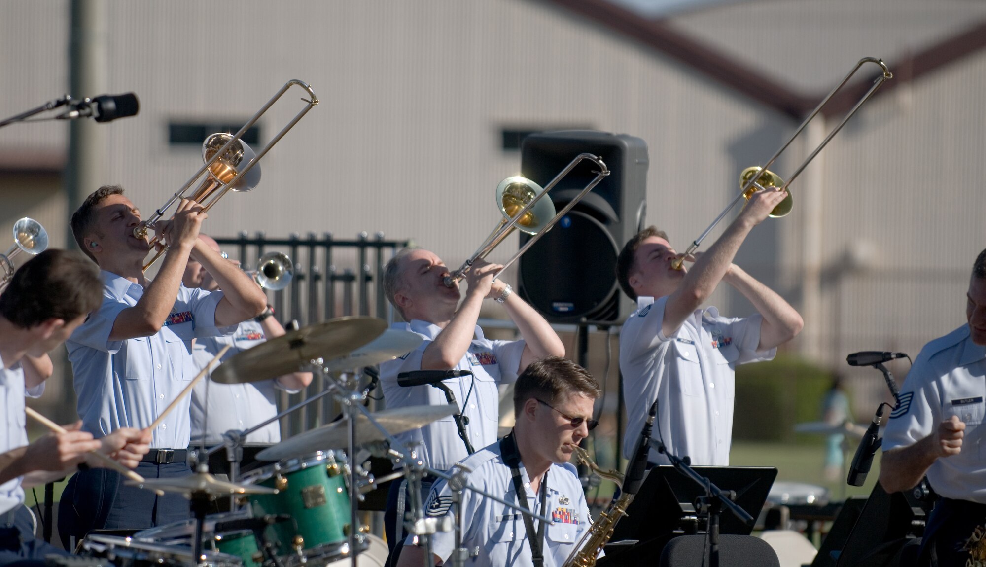 Members of the PACAF Band blow away the crowd during their Sayonara Concert May 20 at Wilkins Field. (Photo by Master Sgt. Nelson James VIRIN 070520-F-8905J-208)