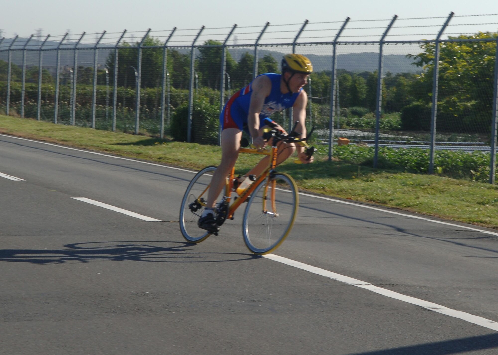 Jeff Jaeger, United States Coast Guard, participates in the Samurai Fitness Challenge and finished in first place. The challenge, one of the Wing Sports Day events, consisted of a 500-meter swim, 7-mile bicycle ride and 5k run.