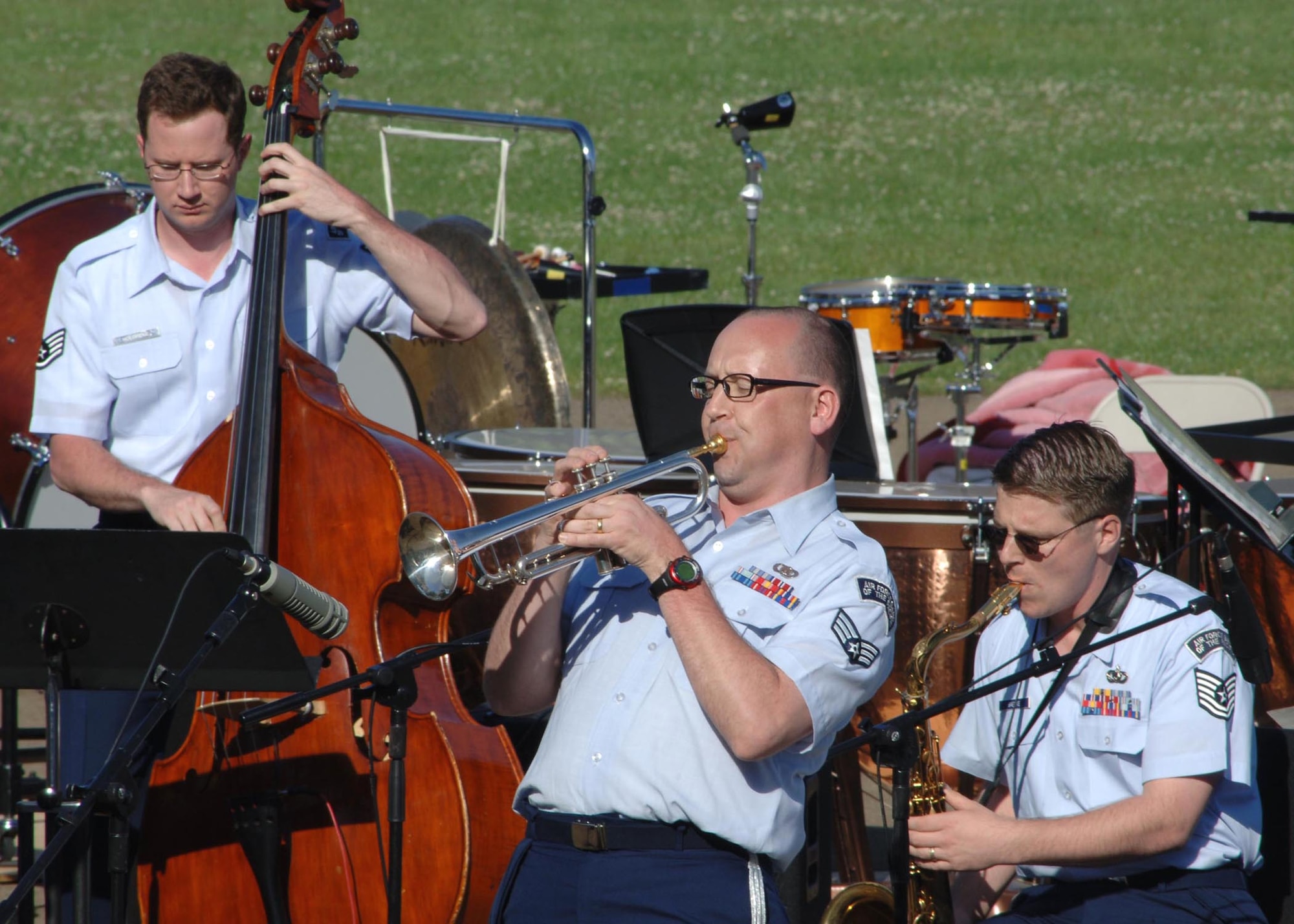 Staff Sgt. Josh Holdridge, Senior Airman Rich McMaster and Tech. Sgt. Jason Baedke, Pacific Showcase, perform during the Sayonara Concert. The concert also included bands from Mizuho, Namura, Akiruno City, Fussa and Musashimurayama. (U.S. Air Force photo by Senior Airman Veronica Pierce 070520-F-3177P-102)