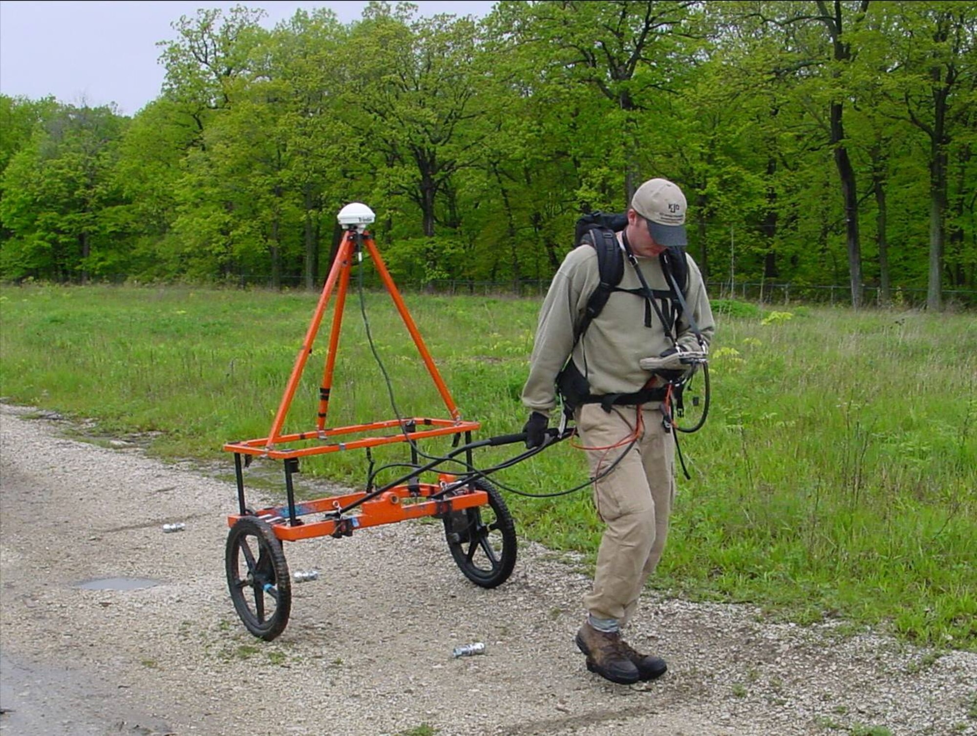 A safety officer with the 30th Space Wing Safety office detects anomalies, which are targets of a ground investigation investigation set to be conducted within West Housing June 11 to 29.  The site to be investigated, which is a requreiment prior to housing privatization, was a possibly used as a Camp Cooke grenade training court in the 1940s. (Courtesy Photo)