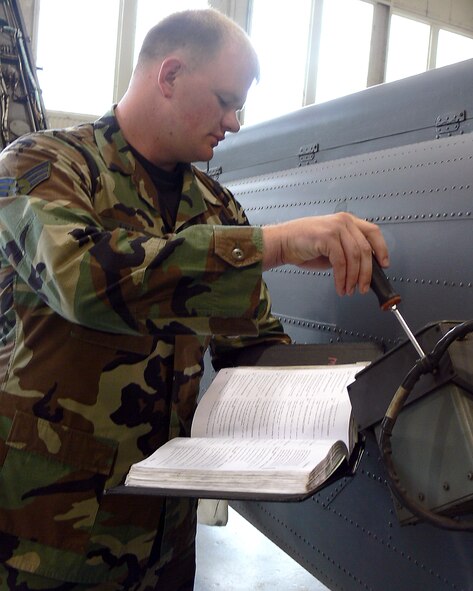 Senior Airman Adam Bragg, 723rd Aircraft Maintenance Squadron, performs maintenance procedures on an HH-60G Pave Hawk recently. Airman Bragg was selected to provide maintenance on Air Force One and will directly support a new mission of keeping the Commander in Chief safe. (U.S. Air Force photo by Airman 1st Class Eric Schloeffel)