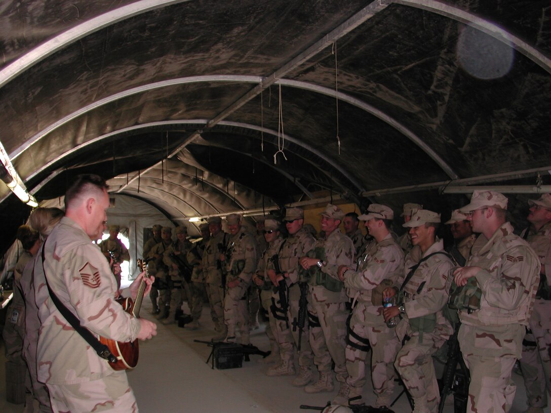 Before they head out on early morning patrols in Northern Iraq, Air Force Security Forces Men and Women enjoy the sounds of Night Wing. Night Wing is the popular music group from the USAF Heartland of America Band that deployed in 2006.