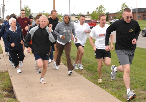 MINOT AIR FORCE BASE, N.D. – People from across base begin the Memorial Day 5K Fun Run May 24 at the McAdoo Sports and Fitness Center here. Philip Blong, 742nd Missile Squadron, was the first to cross the finish line with a time of 18:14. (U.S. Air Force photo by Airman 1st Class Cassandra Butler)