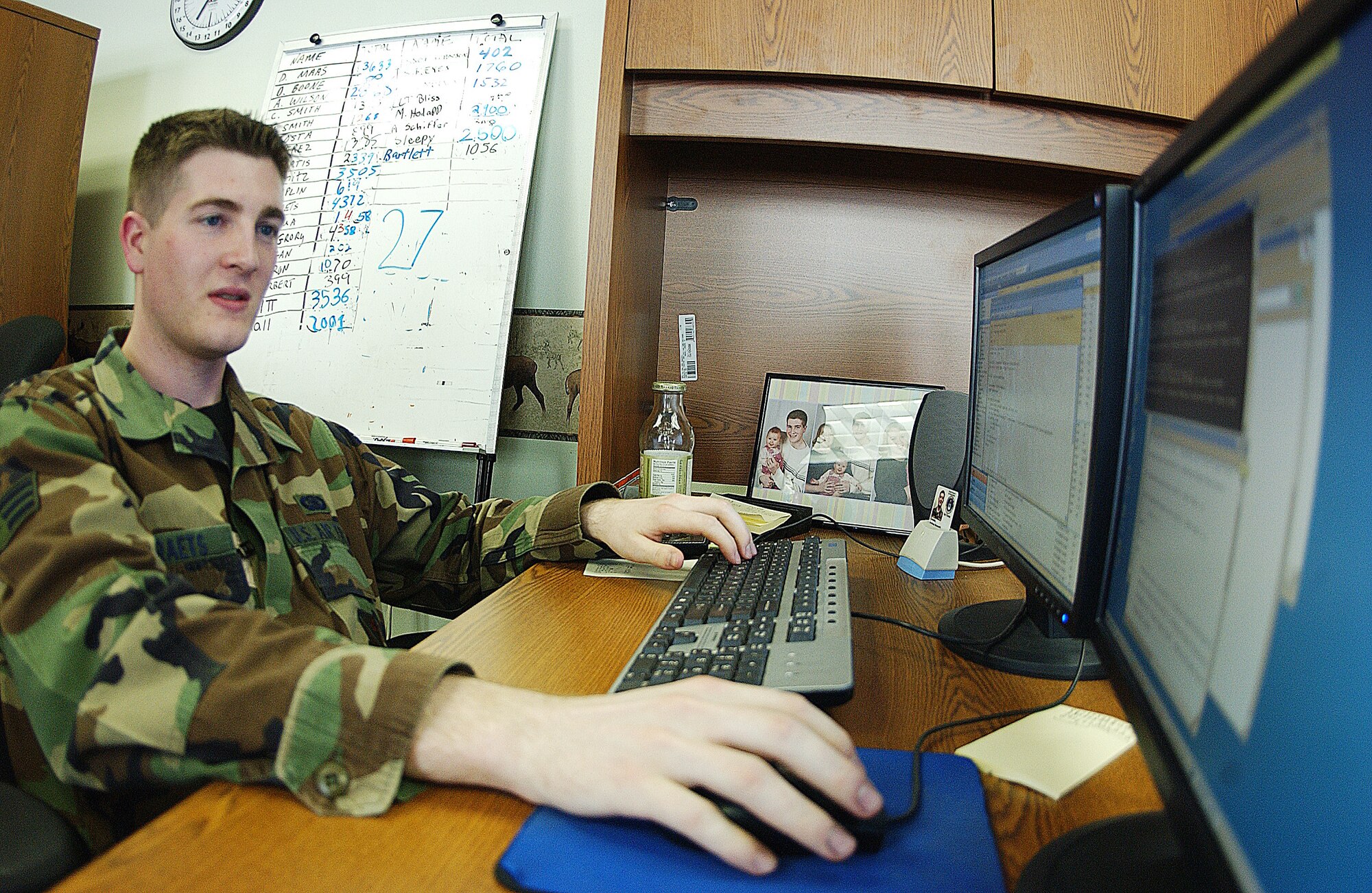 EIELSON AIR FORCE BASE, Alaska -- Senior Airman Andrew Evraets, 354th Communications Squadron network administration, works on a script, writing it in visual basic programming language using Notepad, once finished this script will provide client support administrators their account with the ability to manage and perform their job more efficiently May 22 at the network control center here. The NCC is responsible for more than 2,200 computers on base making sure all are up to date with patches, standard desktop configuration complaint, and ensure day to day mission success. (U.S. Air Force Photo by Airman 1st Class Jonathan Snyder) 