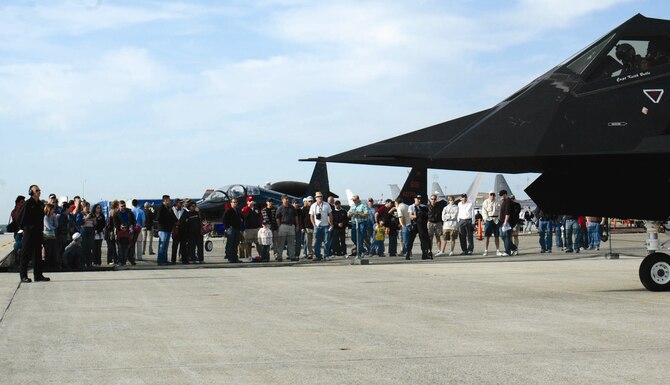 A crowd looks on as Staff Sgt. Brian Donovan, dedicated crew chief with the F-117 Demonstration Team, launches the, “first go,” of the F-117 for the day at the Joint Services Open House, at Andrews Air Force Base, Md., on May 19. (U.S. Air Force photo by 1st Lt. Phil Ventura)
