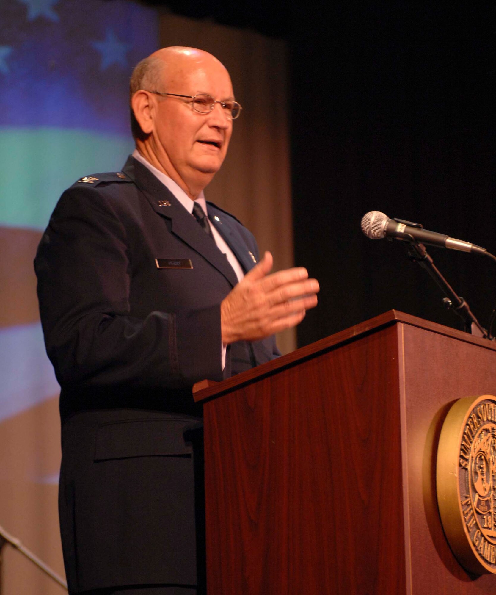 SUMTER, S.C. -- Chaplain (Colonel) Gary Perry, 20th Fighter Wing Chapel wing chaplain and guest speaker, delivers a sermon during a memorial service held at the Sumter Opera House May 23. The memorial service, which served as a kick off to the upcoming Memorial Day weekend, was hosted by Shaw Air Force Base, S.C. and the Sumter community. (U.S. Air Force photo by Tech. Sgt. Keri Whitehead)