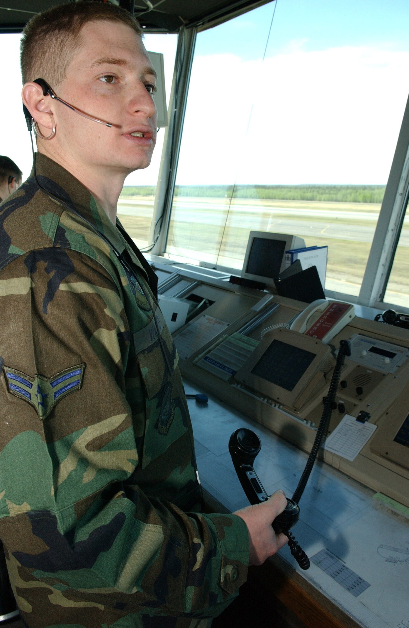 EIELSON AIR FORCE BASE, Alaska --   Airman 1st Class Kenneth Wagner, 354th Operations Support Squadron air traffic controller, releases a new ATIS Automatic Terminal Information Service to all pilots on May 23. The  ATIS is information pilots can repeat that contains the type of weather there is, wind direction, and wind speed, and is updated every time the conditions change.  (U.S. Air Force photo by Airman 1st Class Christopher Griffin)
