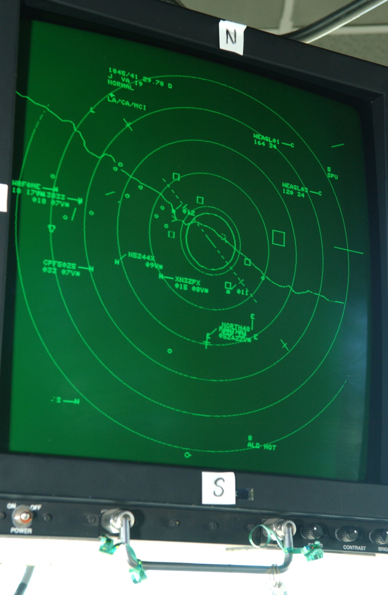 EIELSON AIR FORCE BASE, Alaska -- A radar screen located in the flight tower May 23 keeps track of in-flight aircraft. The radar in Eielson's control tower is linked off of a radar screen located at an airport in Fairbanks, a near by city, which is also the place planes are told to land if conditions are too harsh here at Eielson.   (U.S. Air Force photo by Airman 1st Class Christopher Griffin)