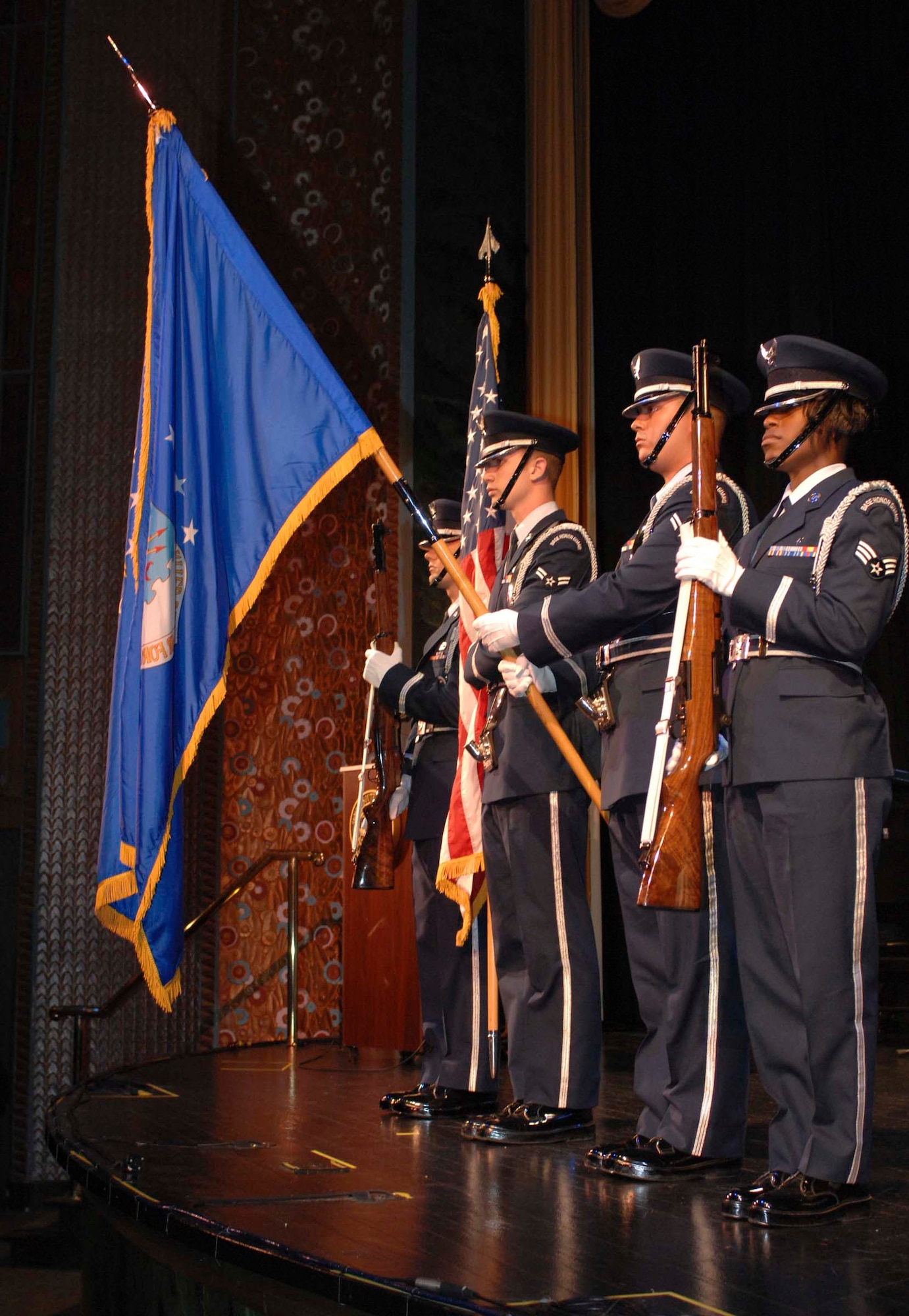 SUMTER, S.C. -- Members of the 20th Fighter Wing Honor Guard post the colors during a memorial service held at the Sumter Opera House May 23. The memorial service, which served as a kick off to the upcoming Memorial Day weekend, was hosted by Shaw Air Force Base, S.C. and the Sumter community. (U.S. Air Force photo by Tech. Sgt. Keri Whitehead)