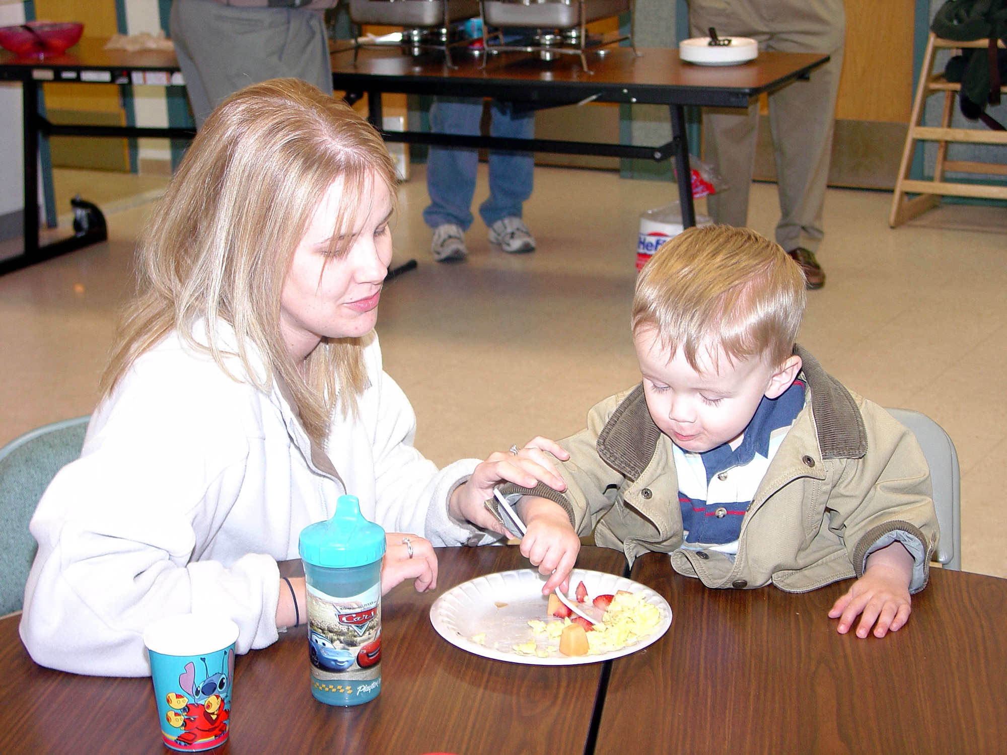 Erin Burmaster and son Andrew, share breakfast at the monthly Hearts Apart Breakfast hosted by the Family Support Center at the Chapel Saturday. Hearts Apart is a program for families of deployed personnel.