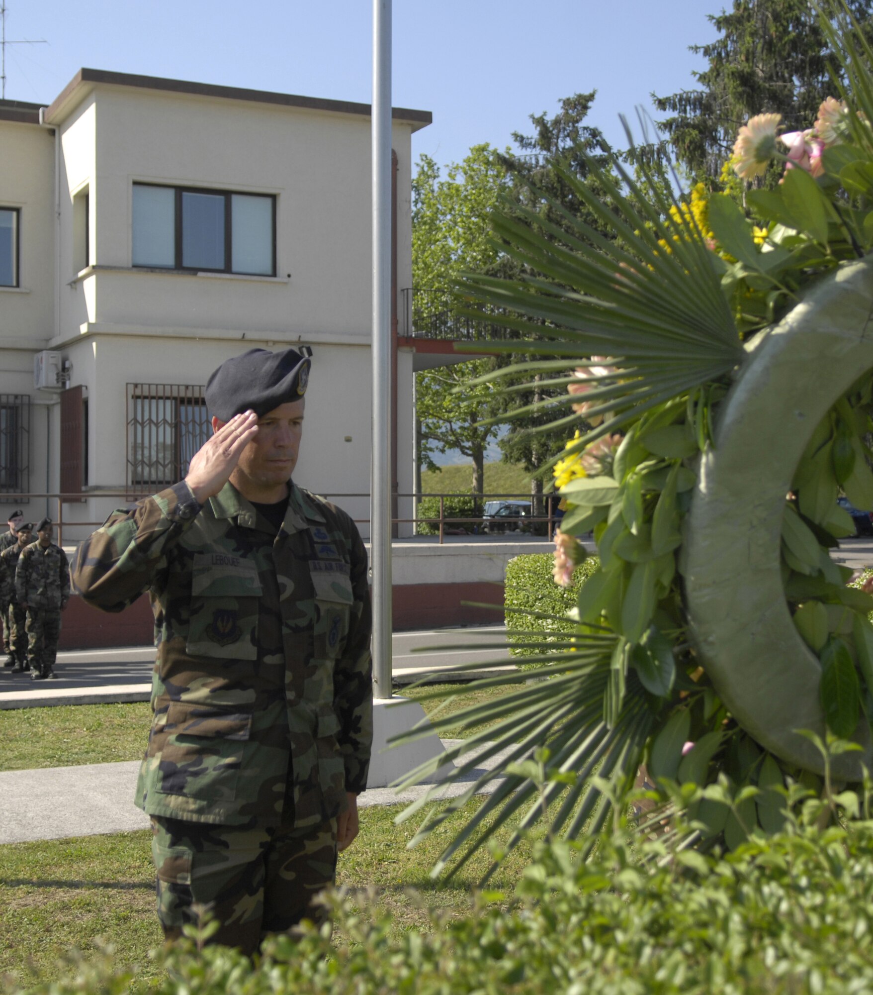 Master Sgt. Darryl LeBouef, 31st Security Forces Squadron, salutes a memorial wreath dedicated to all fallen police officers during a Police Week retreat ceremony May 18. National Police Week was May 13 through 19 and the 31st SFS marked the week by participating in several team-building events.  (U.S. Air Force photo by Airman 1st Class Michael Dorus)