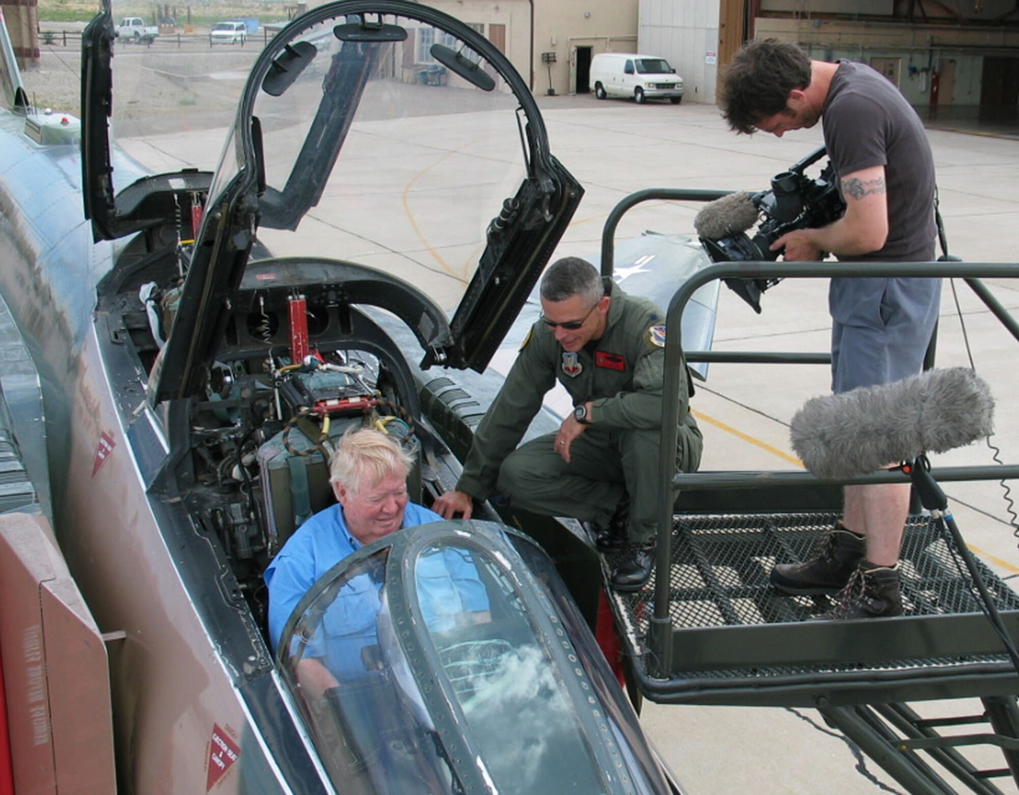 HOLLOMAN AIR FORCE BASE N.M. – Col. J.D. Lee, Det 1, 82nd Aerial Targets Squadron commander, describes the QF-4 drone’s instrument panel to retired Col. Joe Kittinger (in cockpit) while German television WDR camera man Steffen Bohn films. Colonel Kittinger was shot down in an F-4 during the Vietnam War.  A German film crew visited Holloman to tape a documentary about Col. Kittinger, who made a record setting parachute jump from a helium balloon over the Tularosa Basin in 1960.  Det.1, 82nd ATRS is part of the 53rd Weapons Evaluation Group. The detachment provides aerial target support to the White Sands Missile Range. (U.S. Air Force photo/Tommy Fuller)