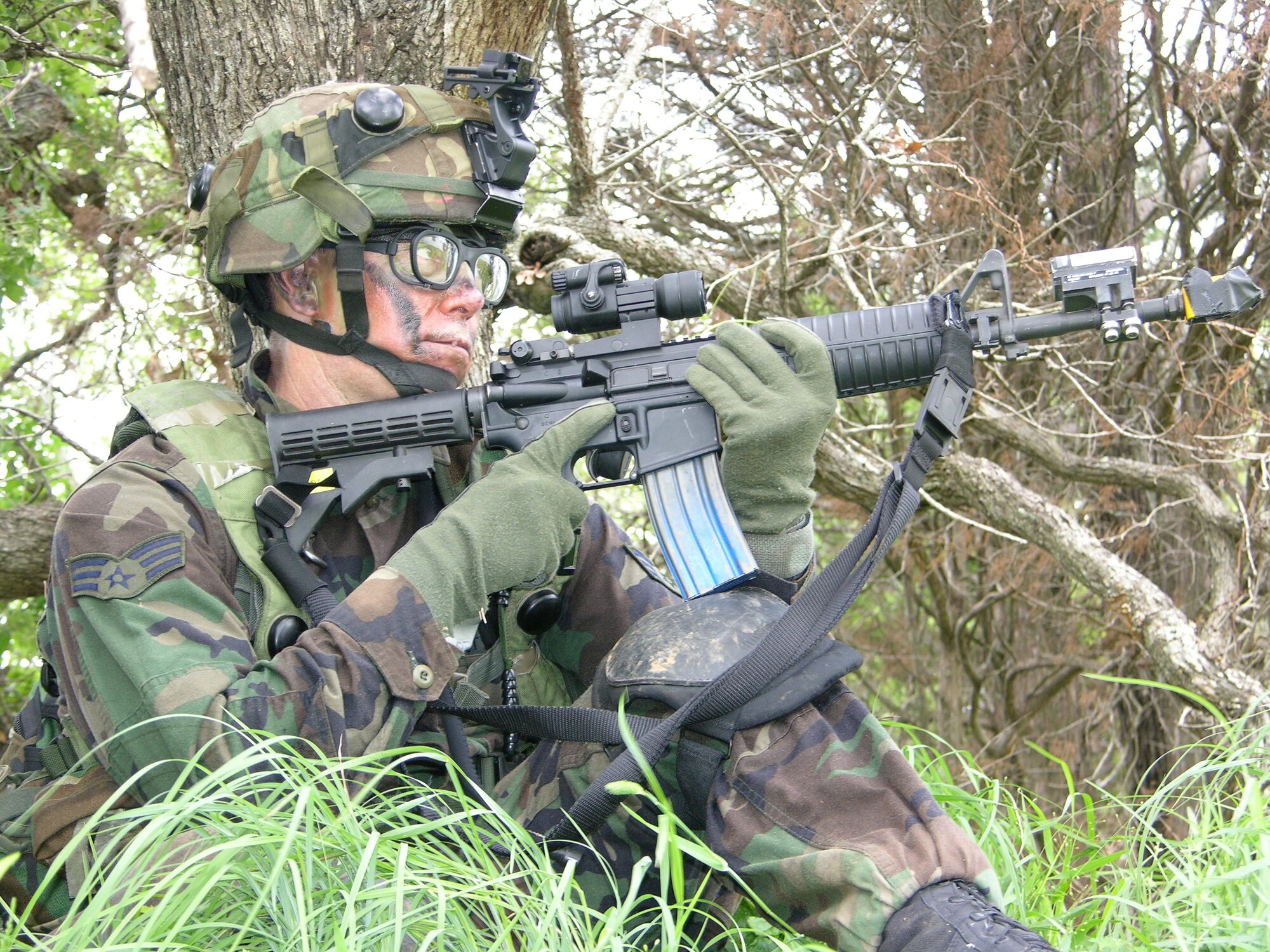 A member of the 916th Security Forces Squadron patiently waits while participating in mandatory pre-deployment training. 'Patriot Defender' training was held at Camp Swift near Austin, Texas. The 916th SFS will be deployed to Iraq later this year. (U.S. Air Force Photo/Staff Sgt. Scott Mathews)         